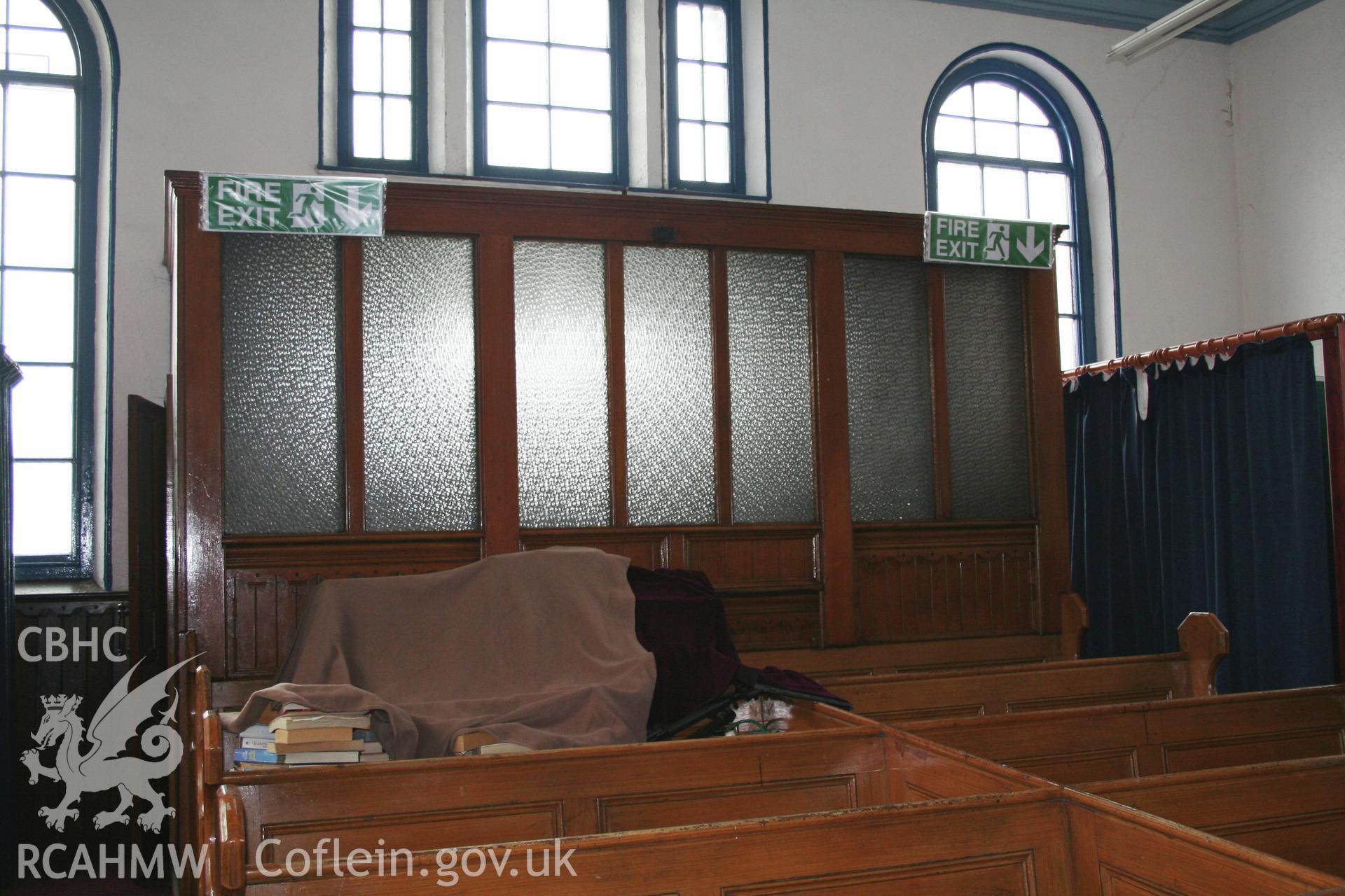 Interior of chapel, detail of glazed vestibule.