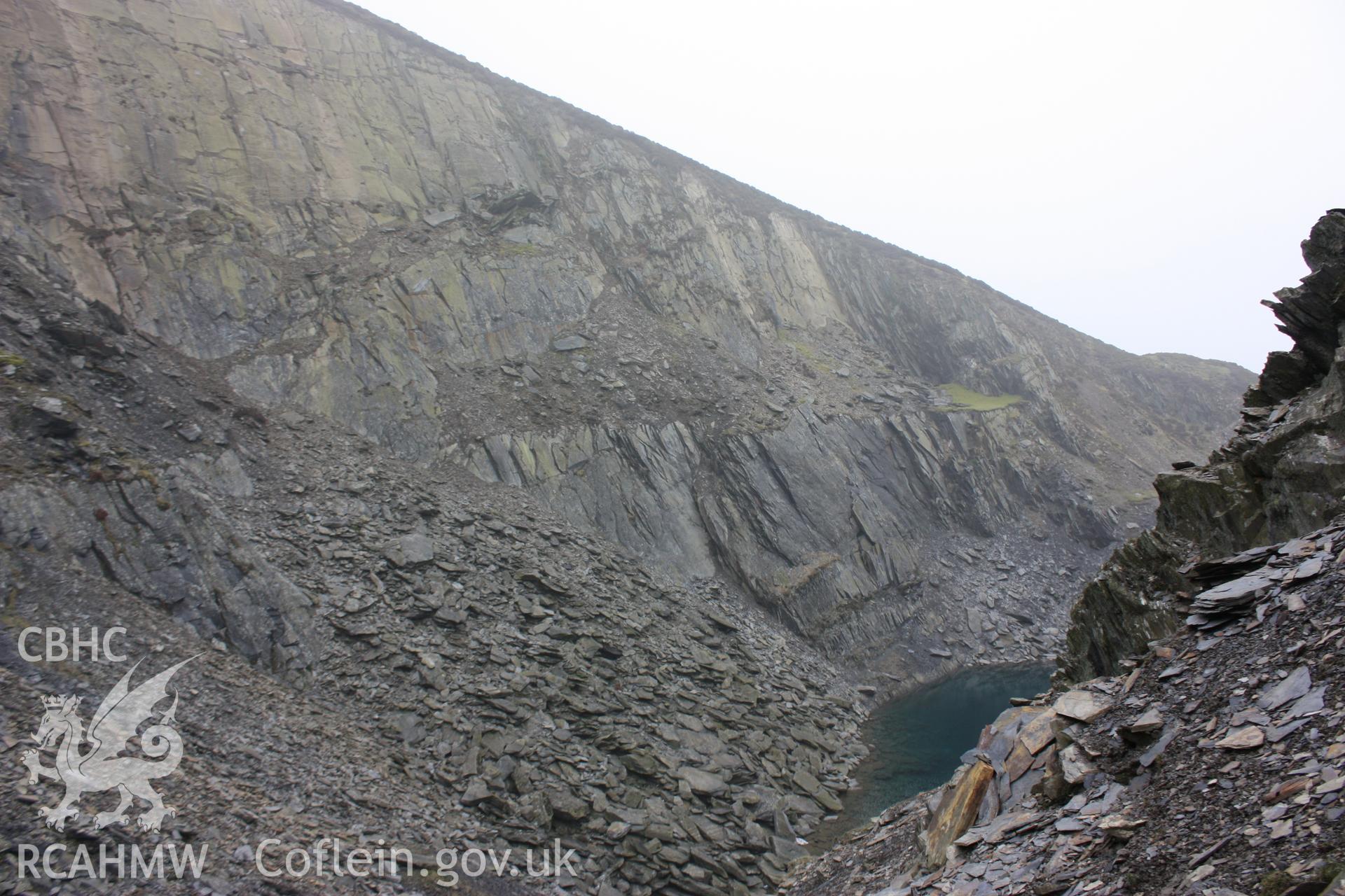 Nineteenth century tramroad at Moel-y-Faen quarries. The old terminus of the tramroad is indicated by a patch of grass halfway up the quarry face.