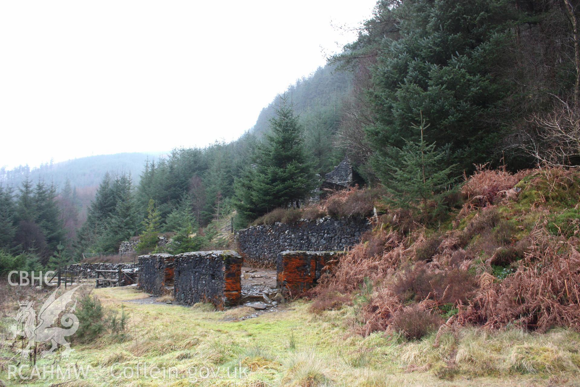 Ystrad Einion metal mine.  Looking south across the remains of the ore store.