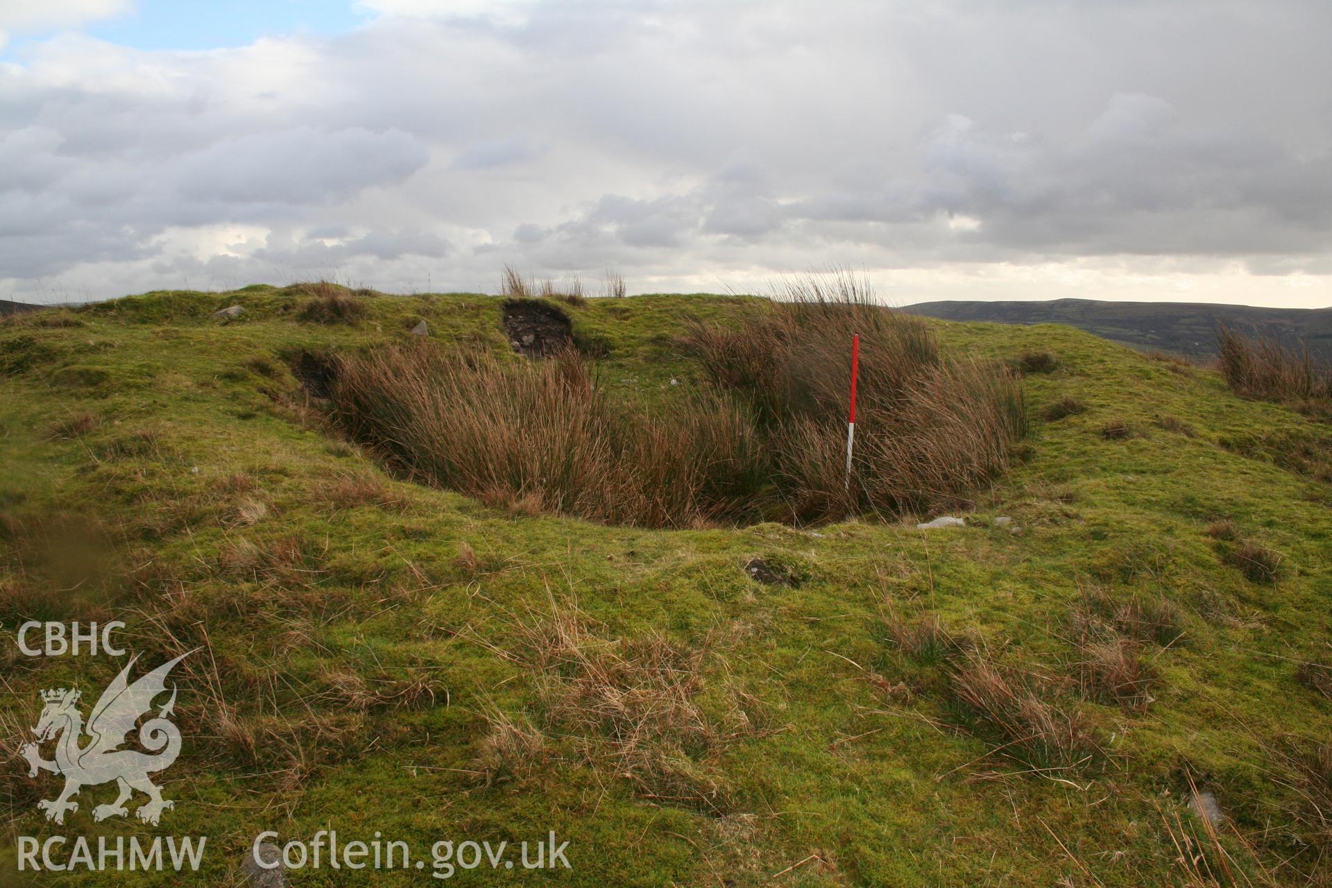 Robbing hollow towards north edge of cairn.