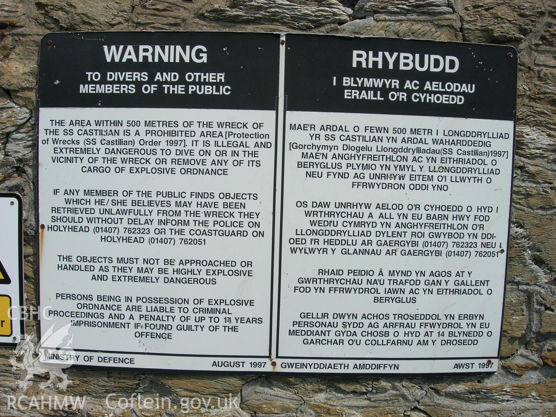 Warning notice displayed on Holyhead Harbour wall regarding the designation of the CASTILIAN as a dangerous wreck under Section 2 of the Protection of Wrecks Act 1973.