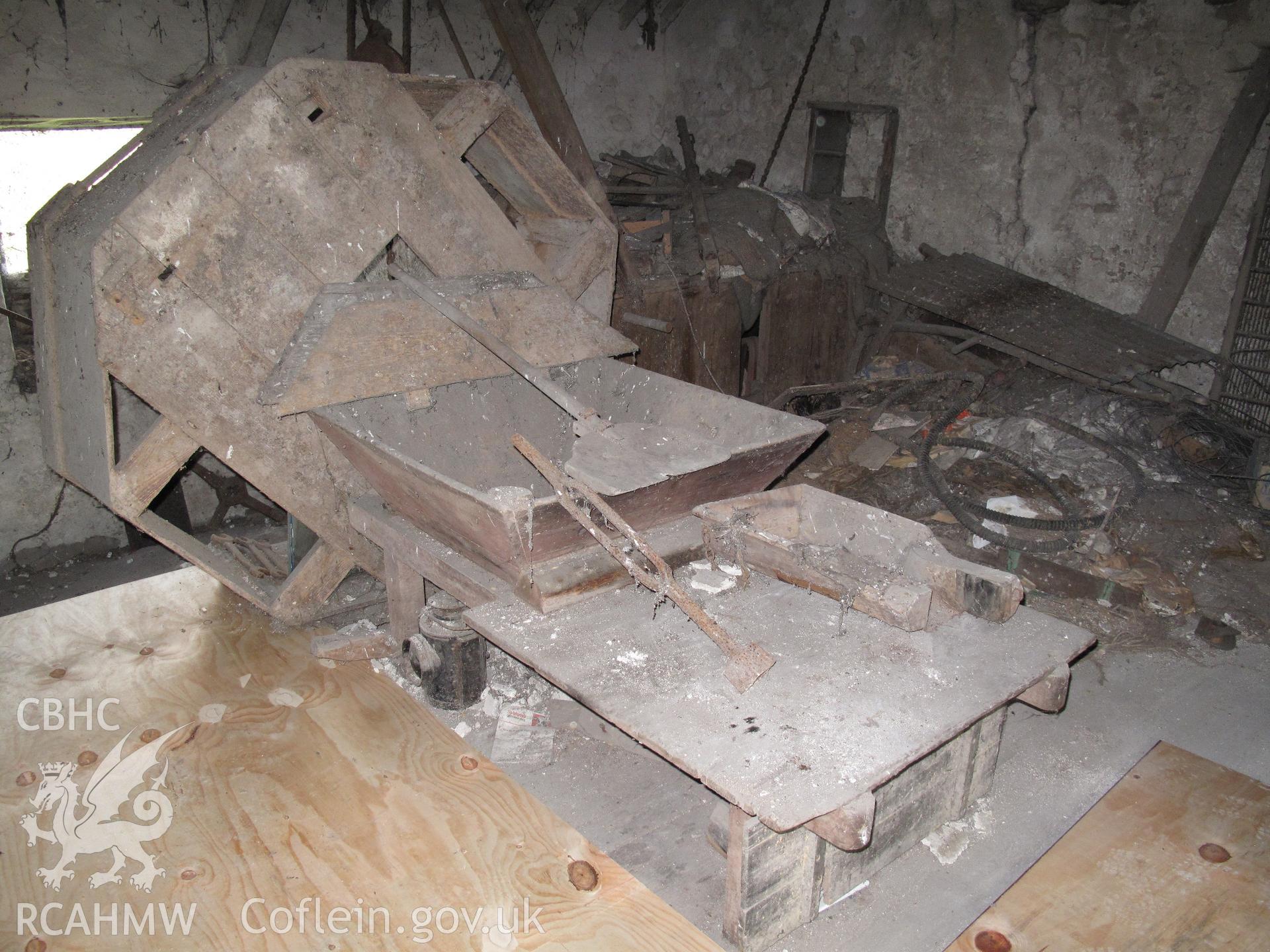 Grain chute and tun cover to millstones in Melin Llecheiddior.