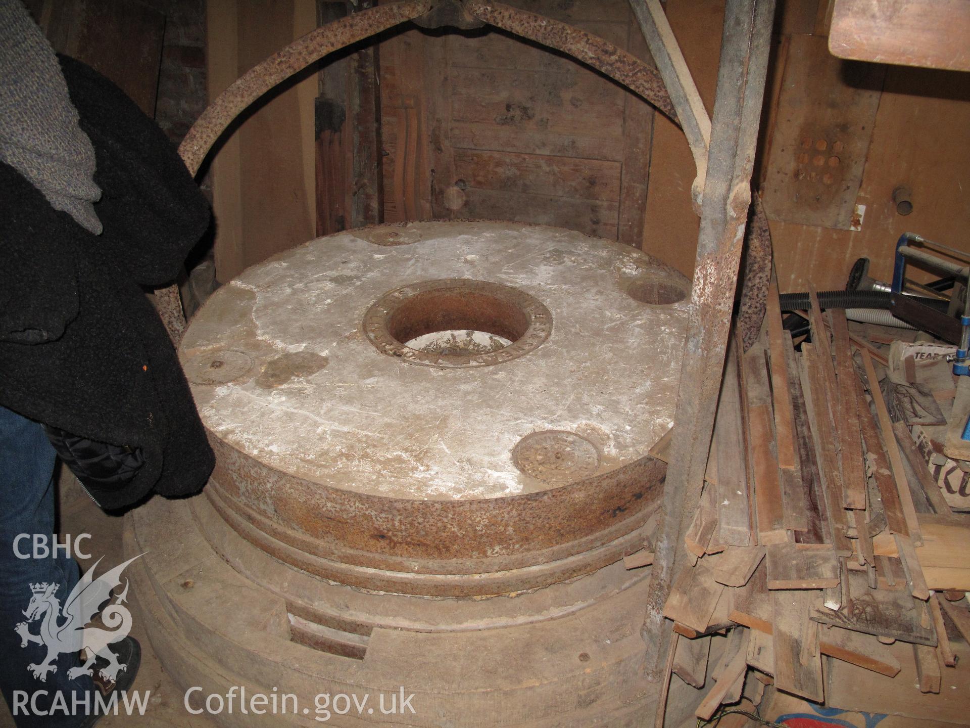 Millstones and crane in Llifior Mill, Garthmyl, taken by Hilary Malaws on 17 October 2009.