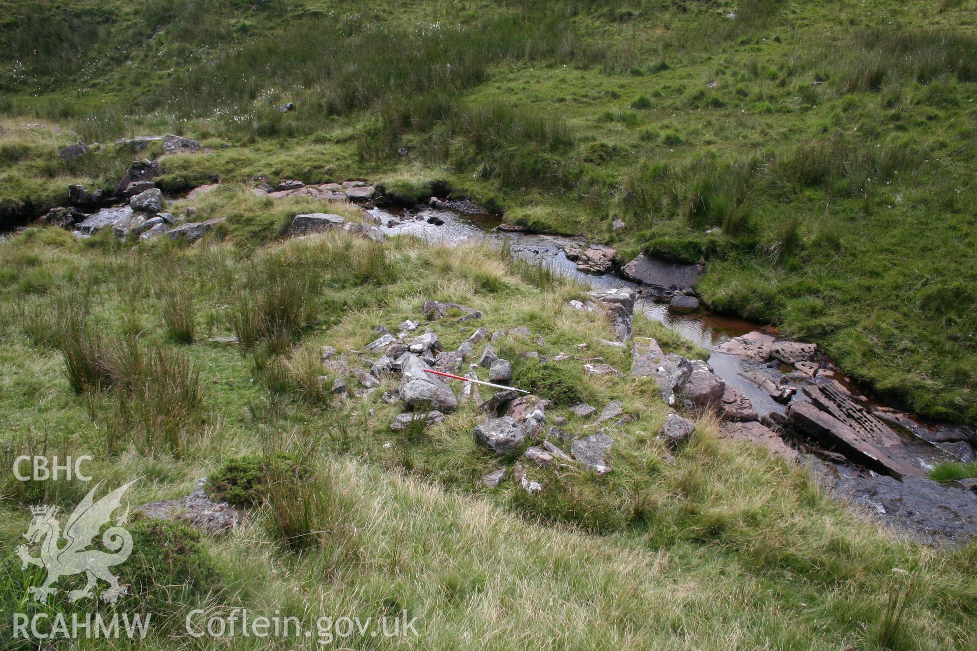 Stone pile seen from the north; 1m scale.