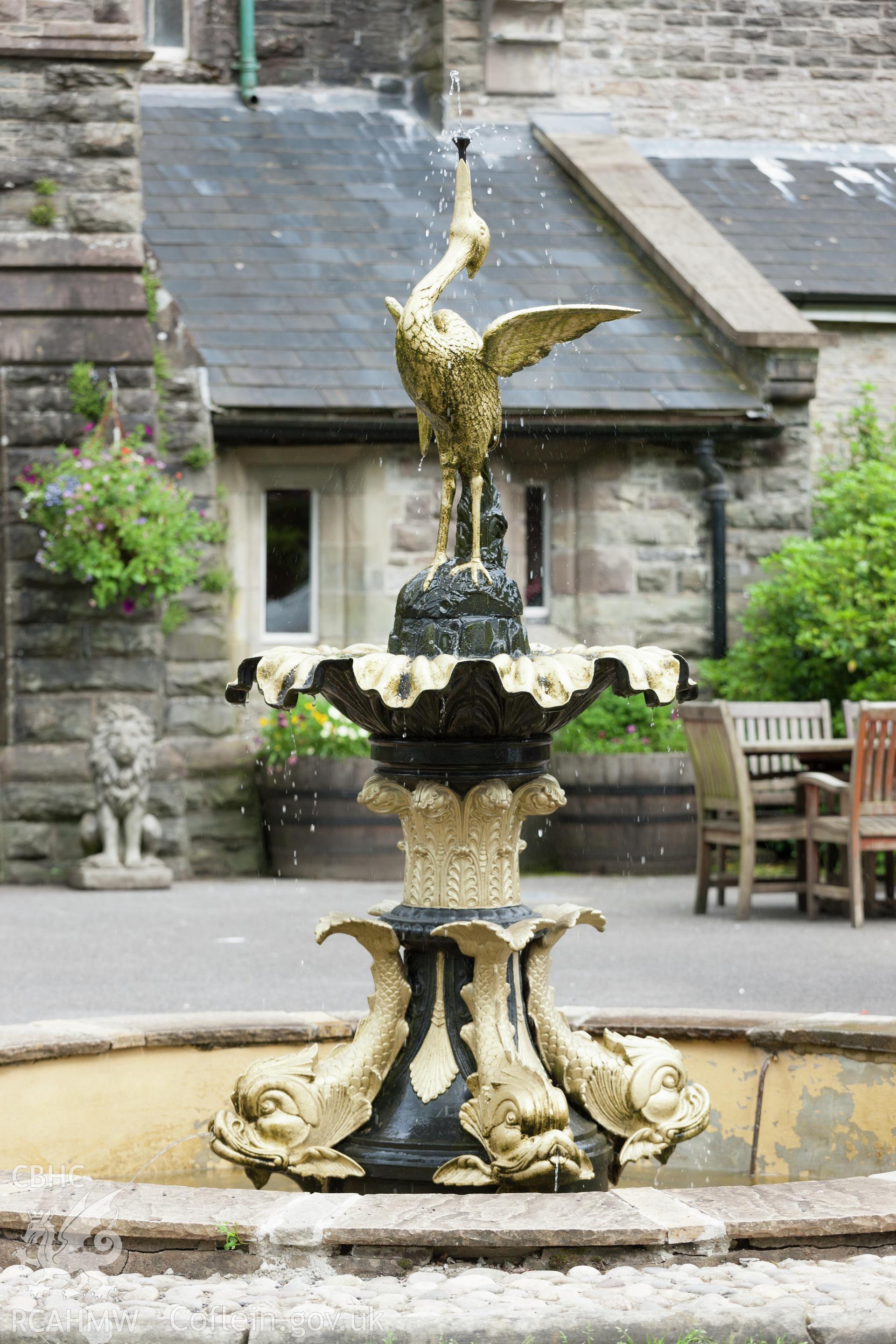 Cast iron fountain in courtyard.