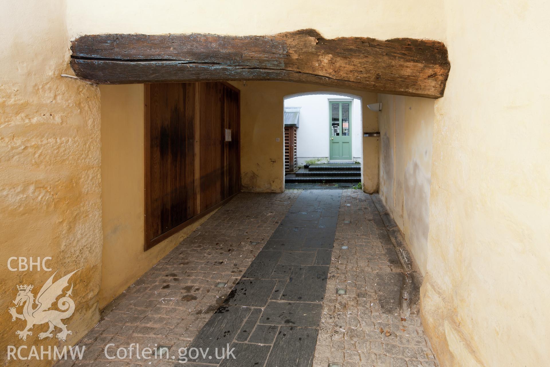 Photograph of fireplace bressumer, from the rear.