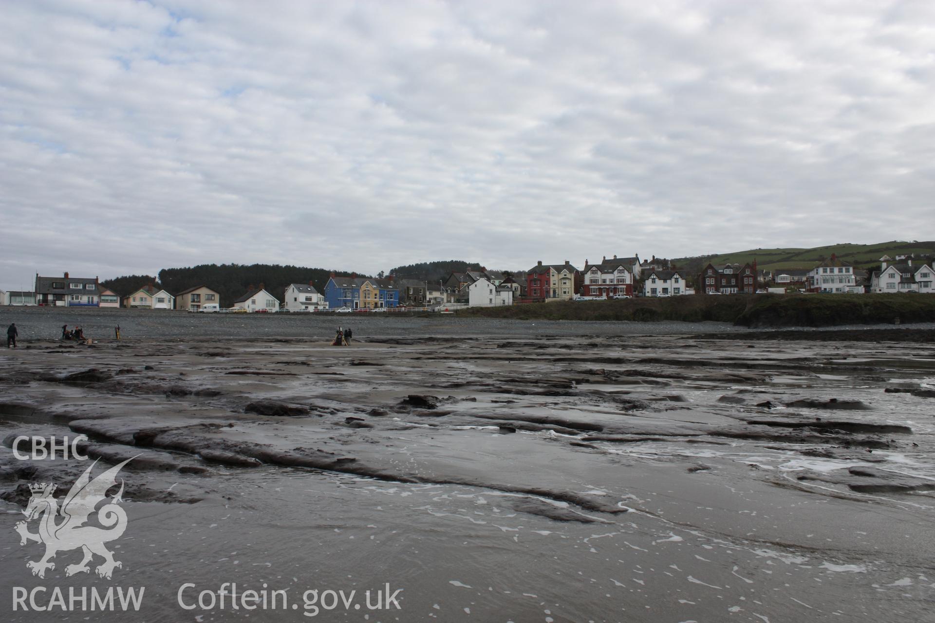 Borth submerged forest (between RNLI lifeboat station and upper Borth), looking southeast towards High Street and Clarach. Showing southern section of peat exposures