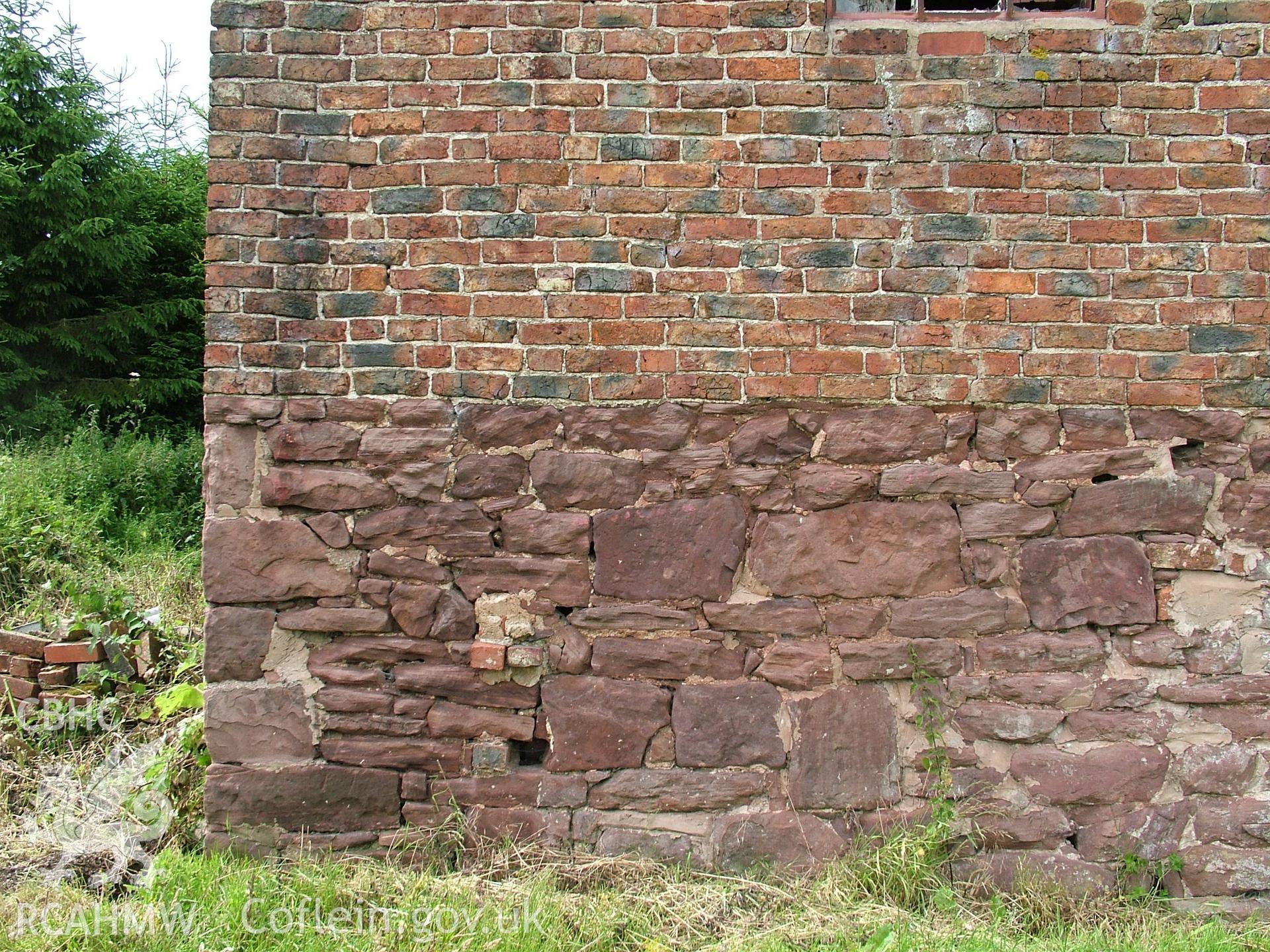 Colour digital photograph showing part of an exterior wall of Crab Mill, Ruabon.