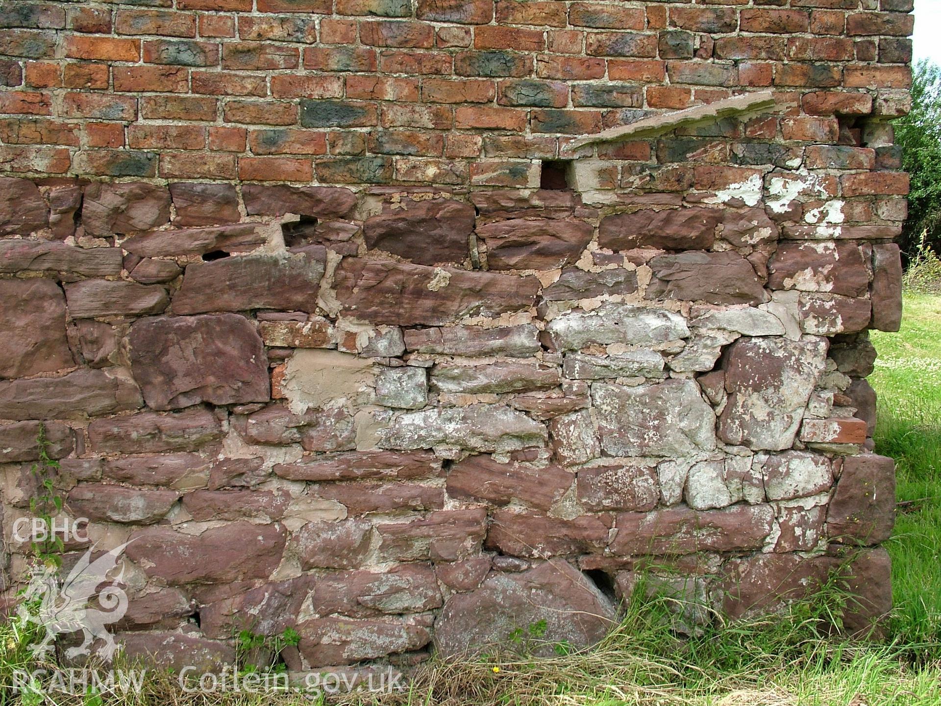 Colour digital photograph showing part of an exterior wall of Crab Mill, Ruabon.