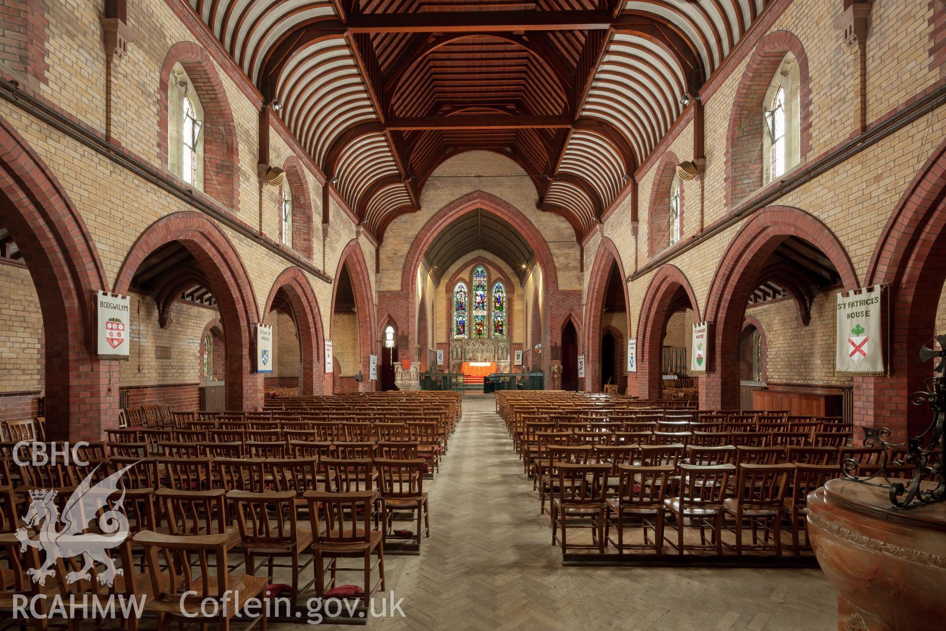 Interior from the southwest, internal lighting in chancel.