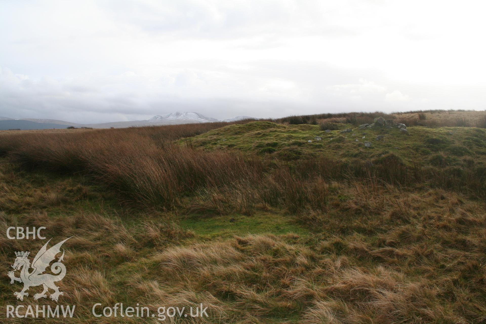 Cairn, in foreground, viewed from the north-east towards the Fan escarpment.
