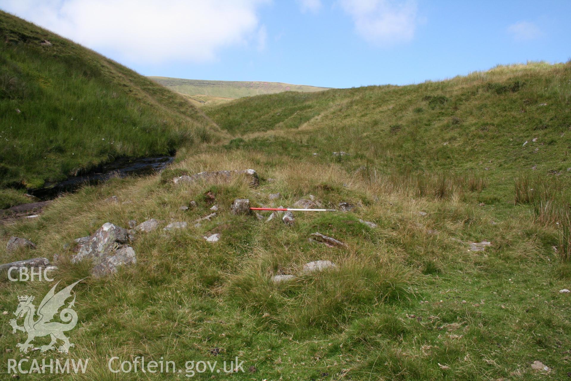 Collapsed structure seen from the north-east; 1m scale across 'passage'.