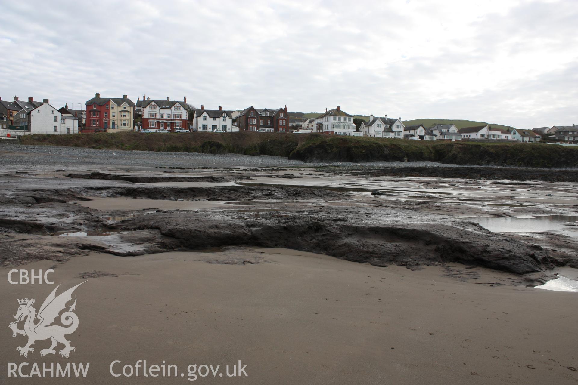 Borth submerged forest (between RNLI lifeboat station and upper Borth), looking east towards Clarach. Showing edge of peat exposures at eastern end of beach.