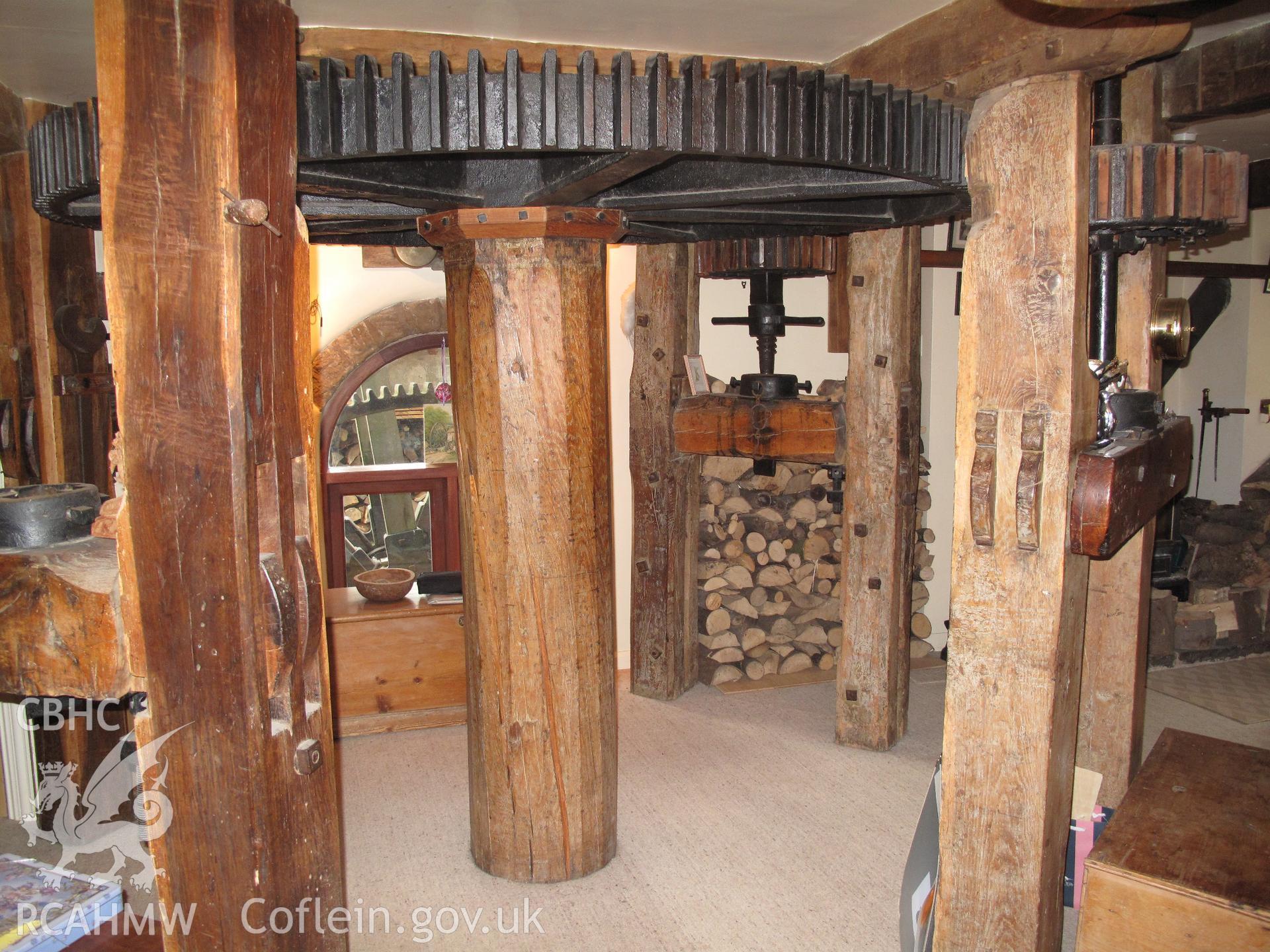 Interior view of Trevor Corn Mill, showing great spur wheel and stone nuts.