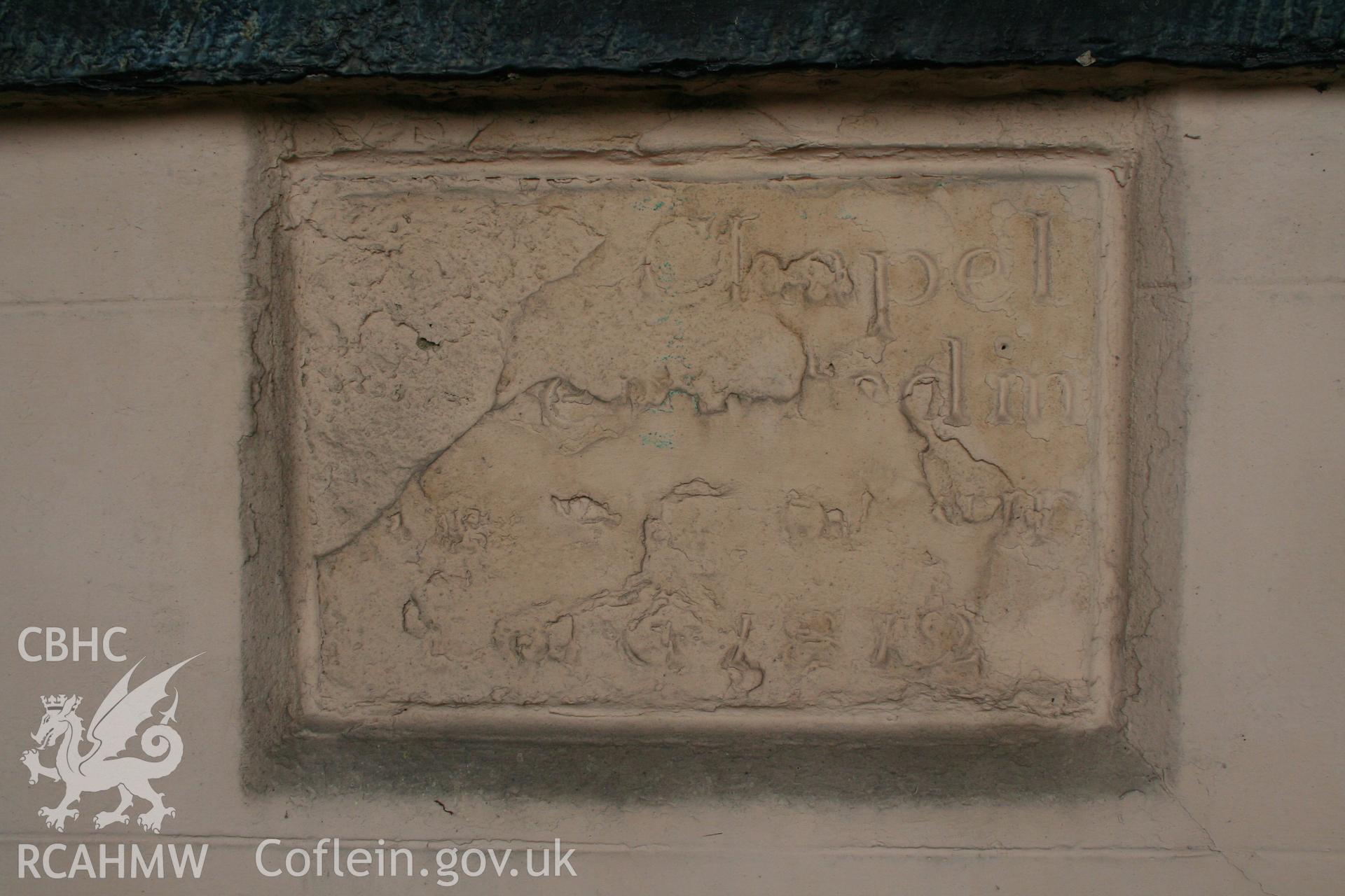 Date stone, extensively weathered