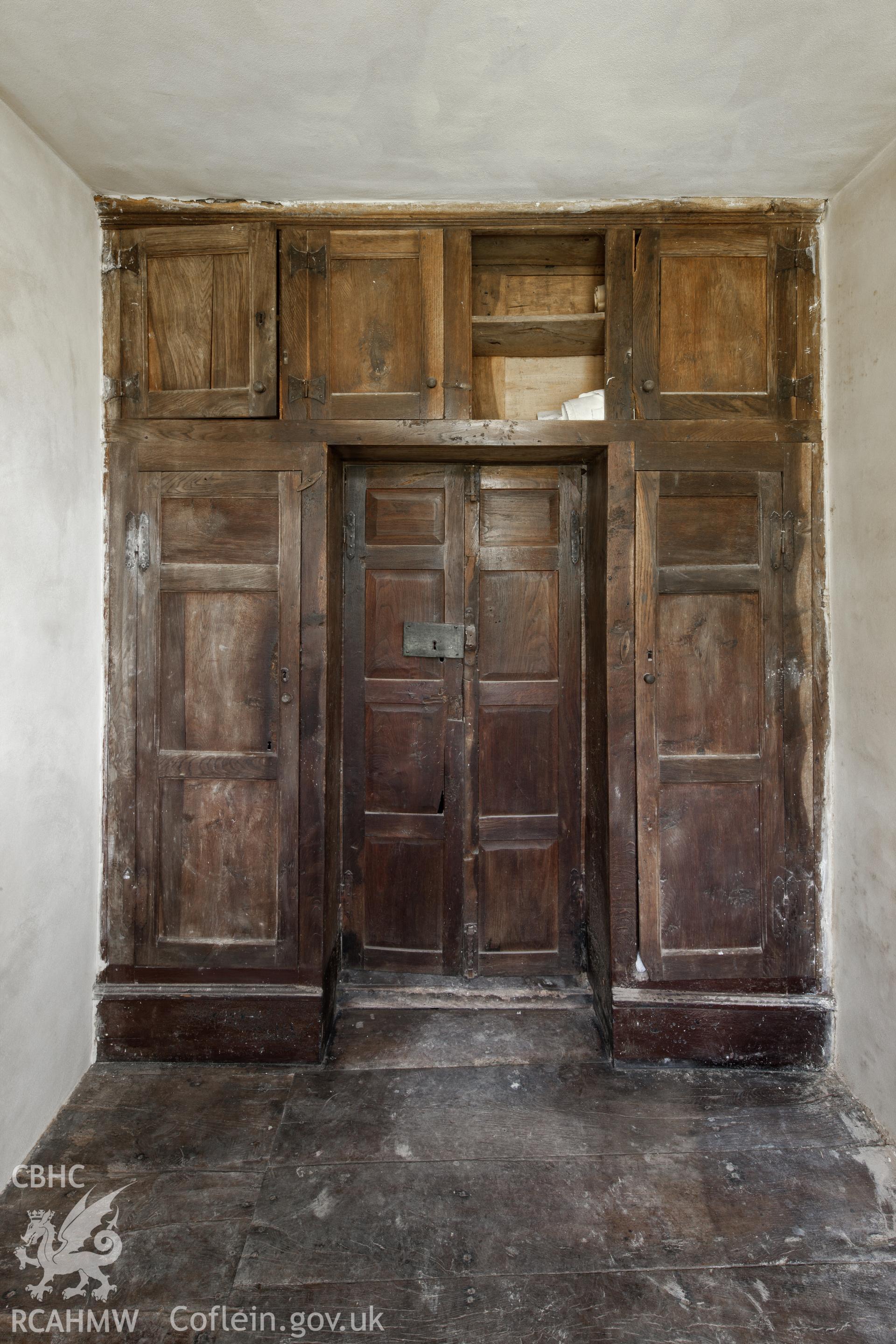 Porch, first floor, built in cupboards.