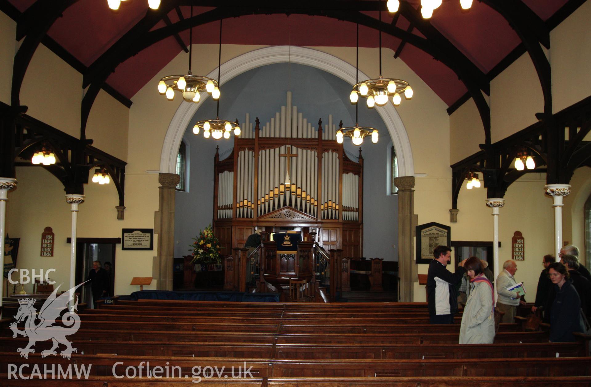 Interior, view of pulpit & organ, showing aisles