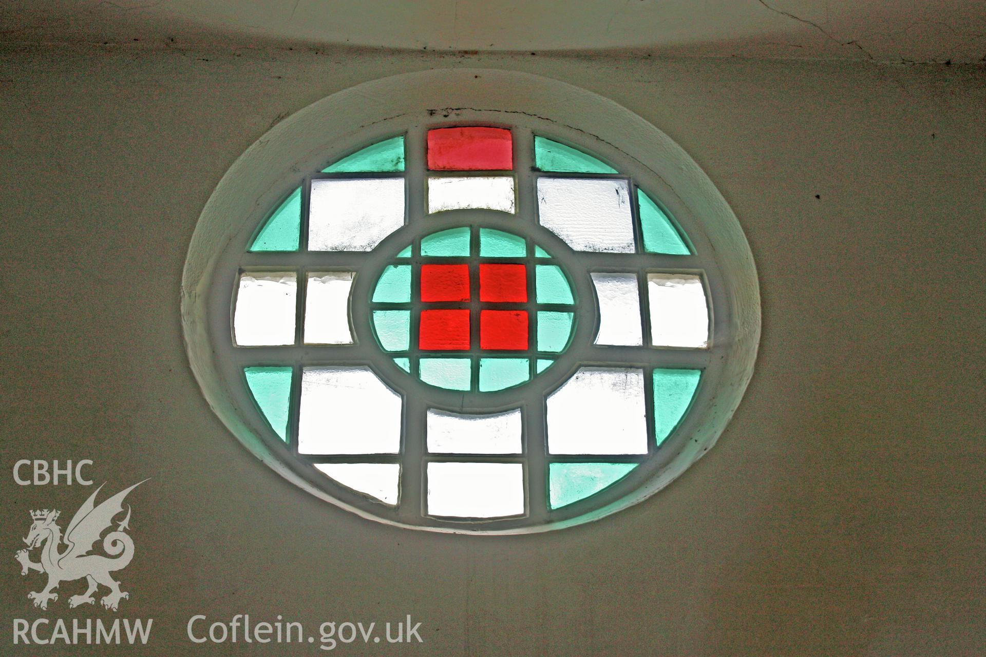 Interior, circular stained glass window