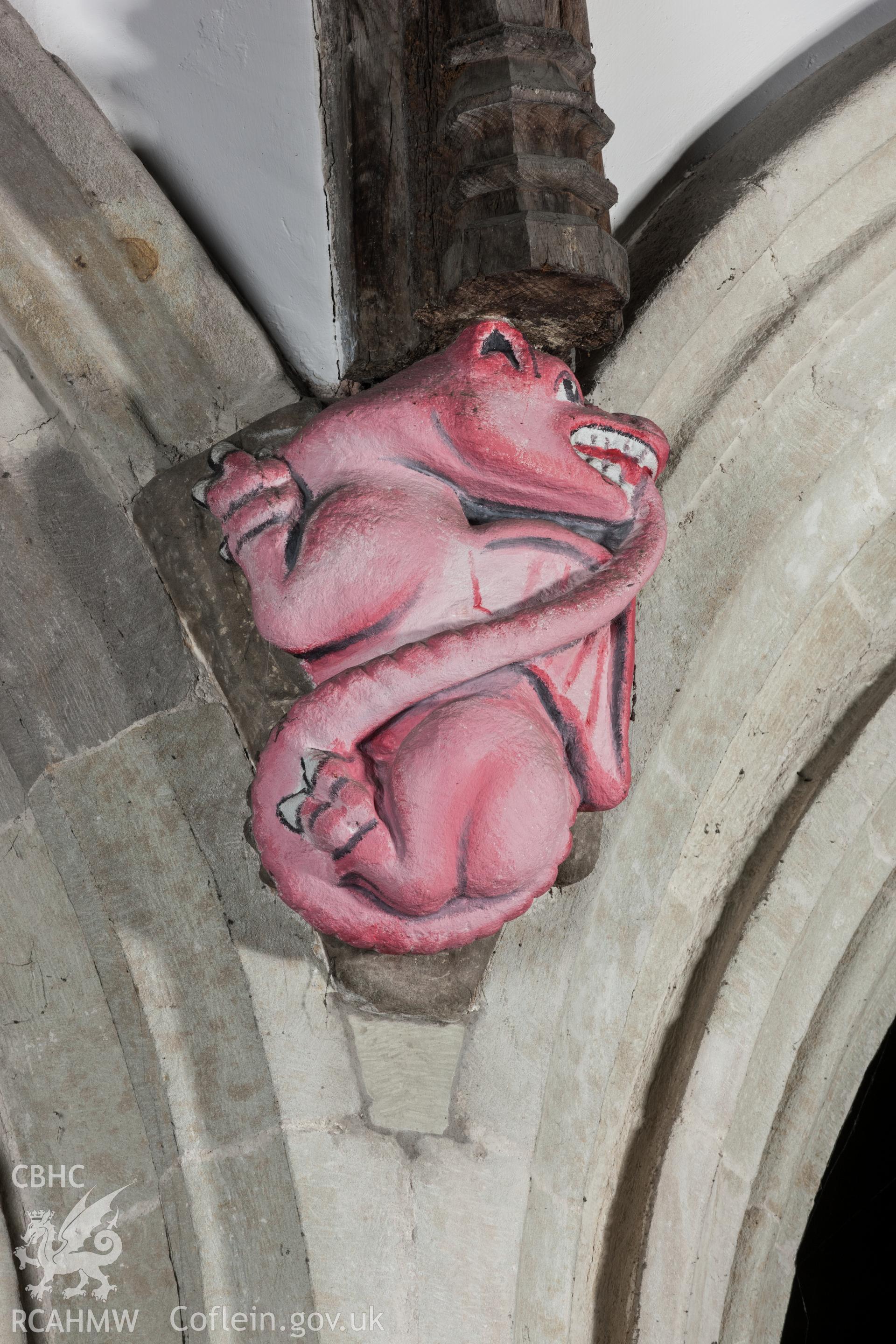 Stonecarvings on arcade.