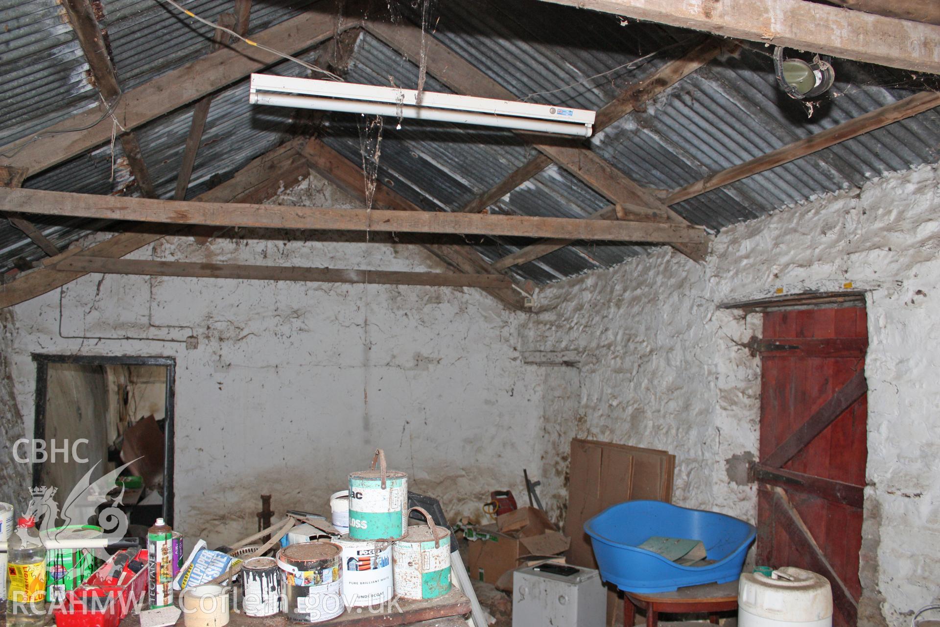 Interior,  cow-house, view towards south-west gable-end.