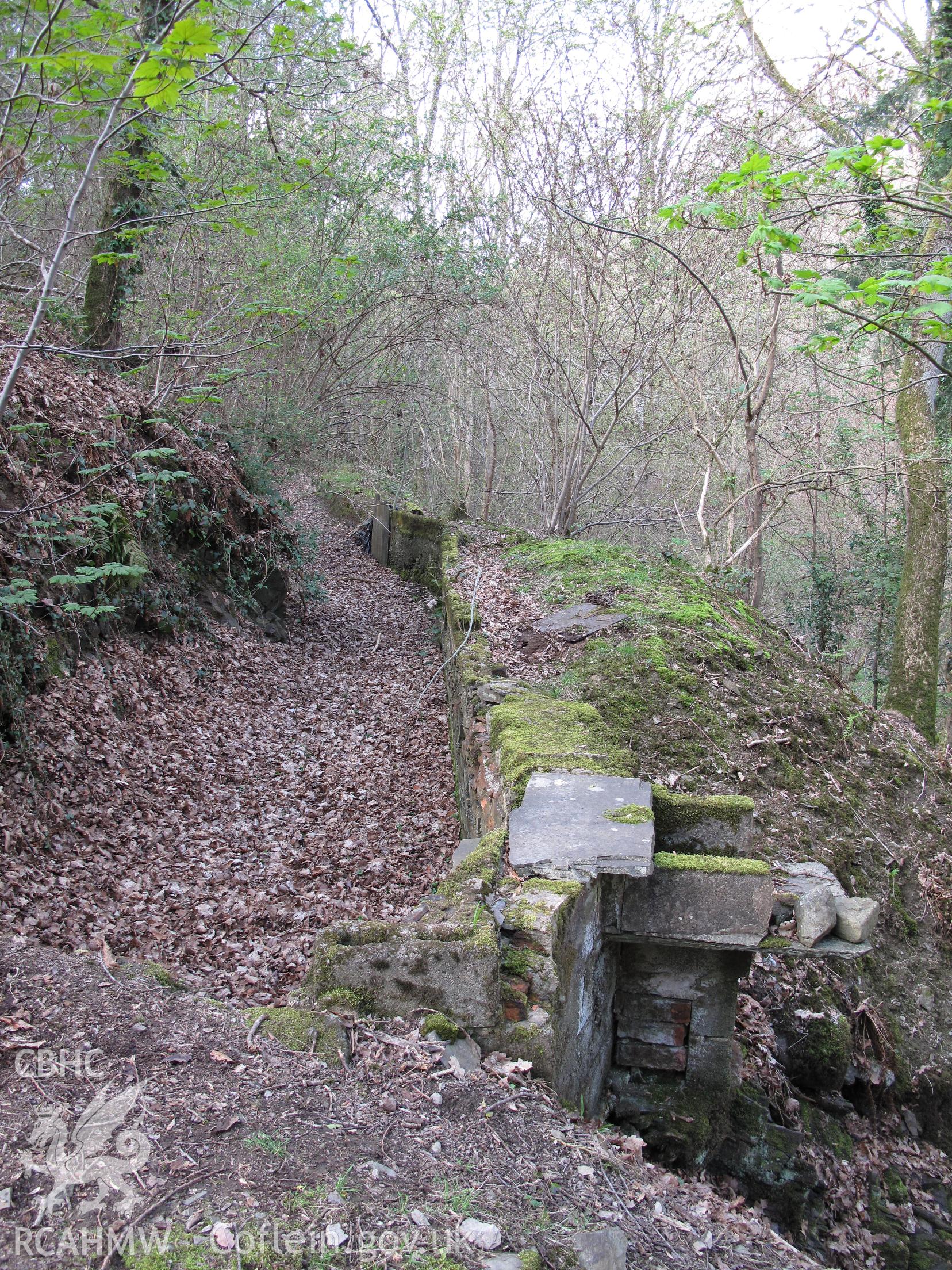 Leat for Pant-y-gynnau water wheel, from the southeast, taken by Brian Malaws on 18 April 2009.