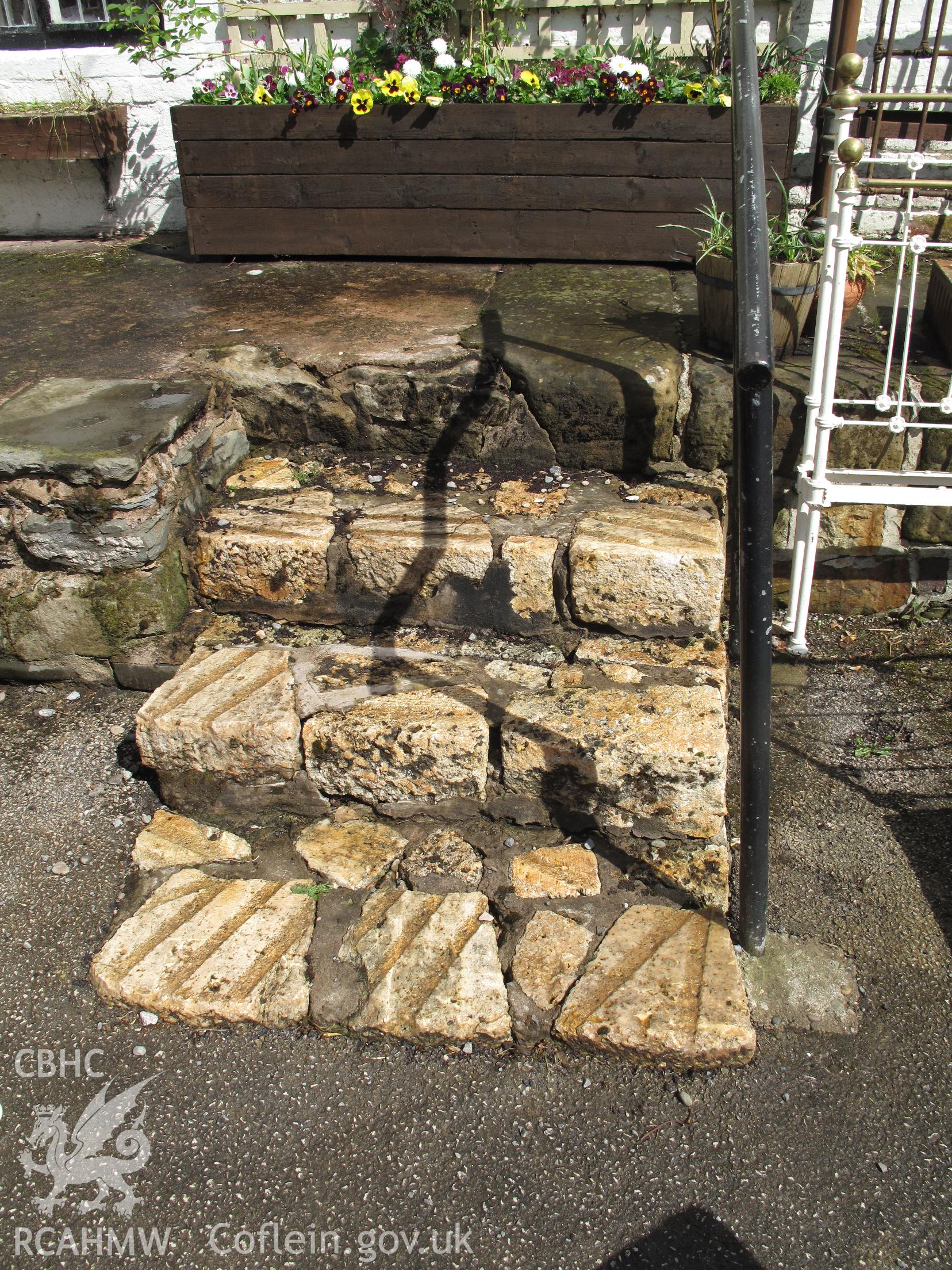 Steps outside Chirk Corn Mill, made from millstone pieces.