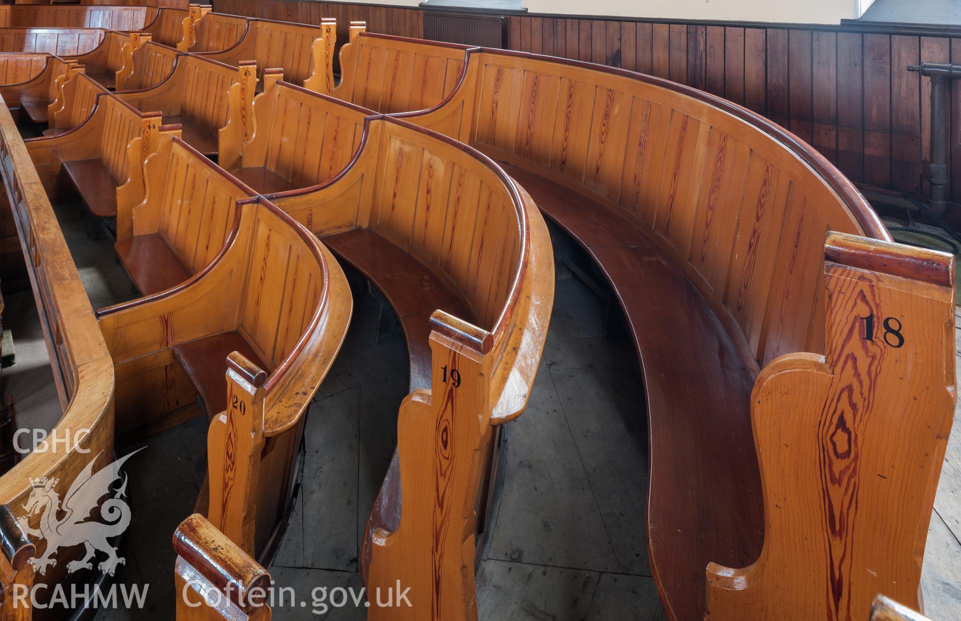 Detail of pews on gallery