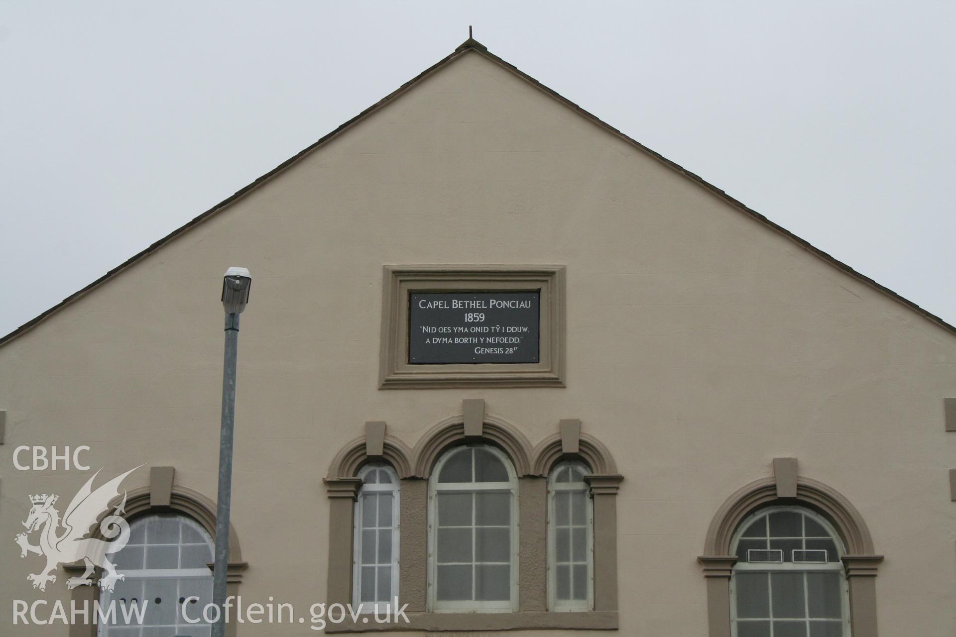 Exterior, date stone, east elevation