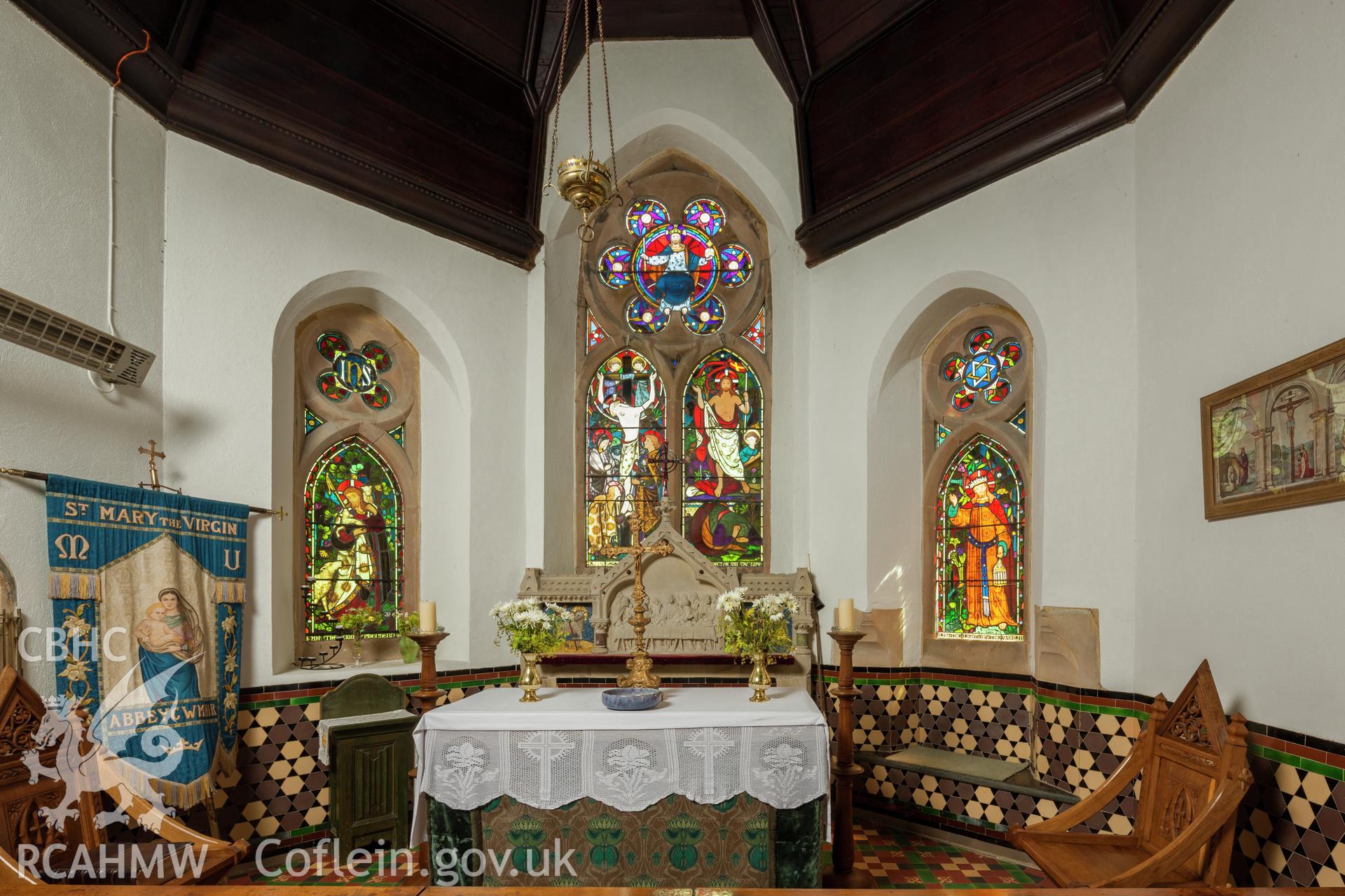 Interior, altar and stained glass.