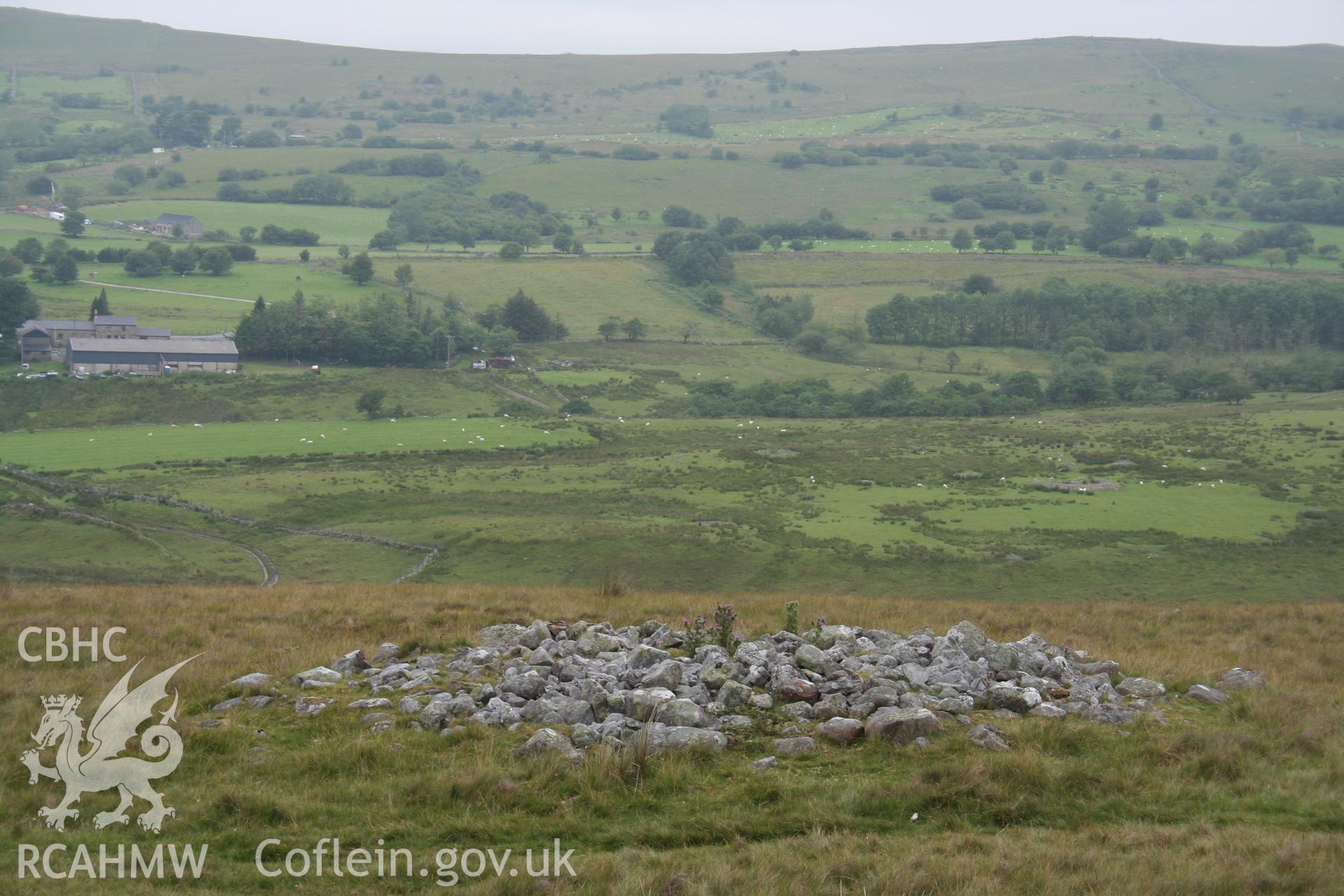 View of cairn in its landscape setting from the south.