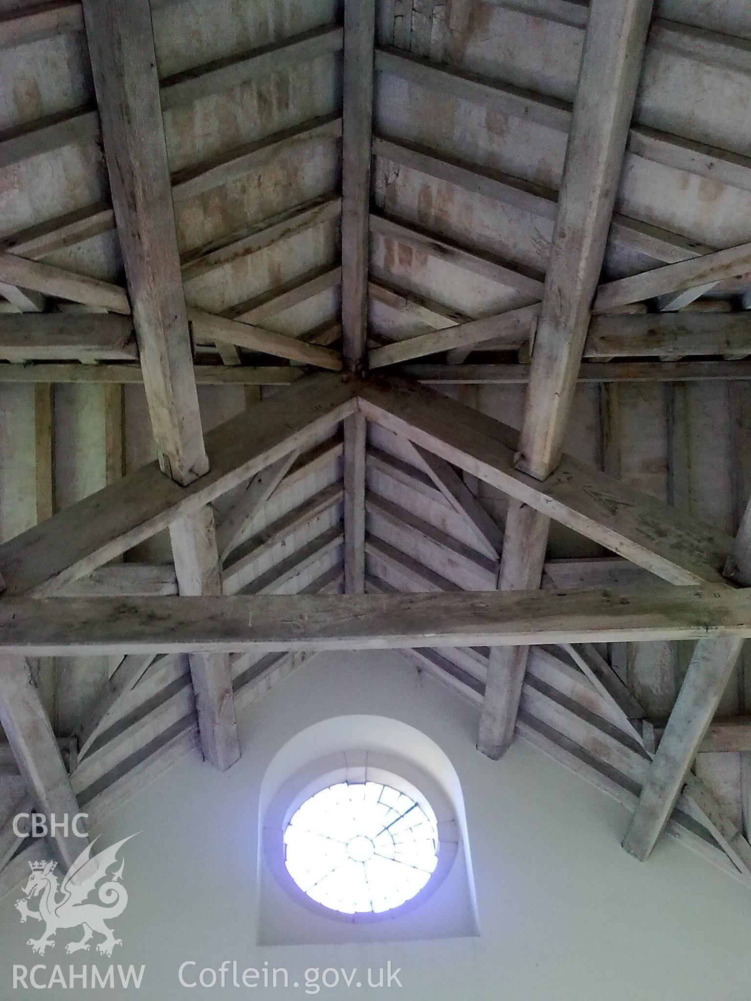 View of roof structure of central bay looking towards the front of the building and oriel window.