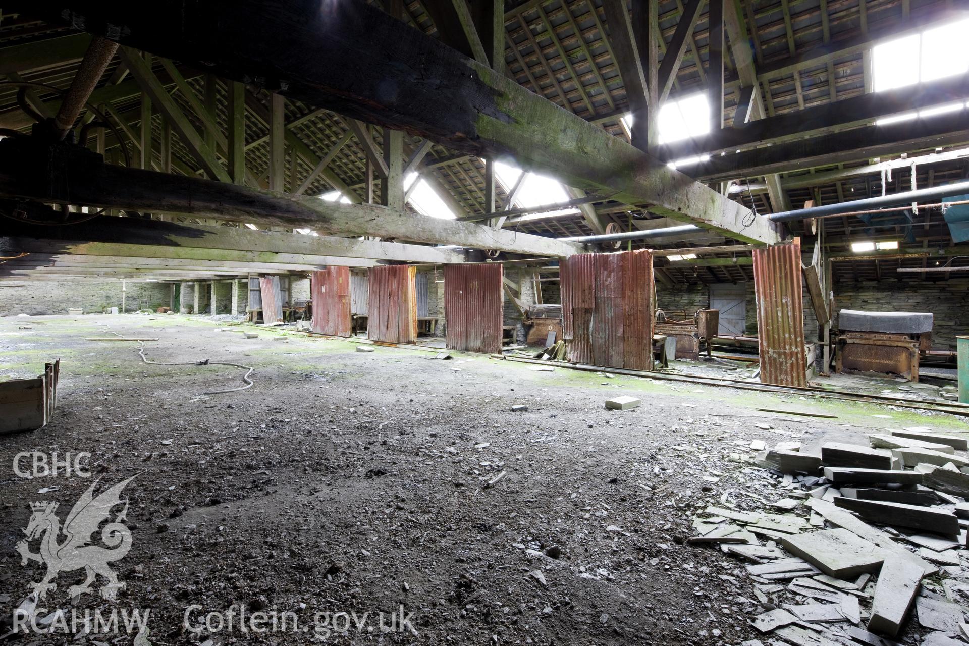 Dressing machines, racked down the external walls.