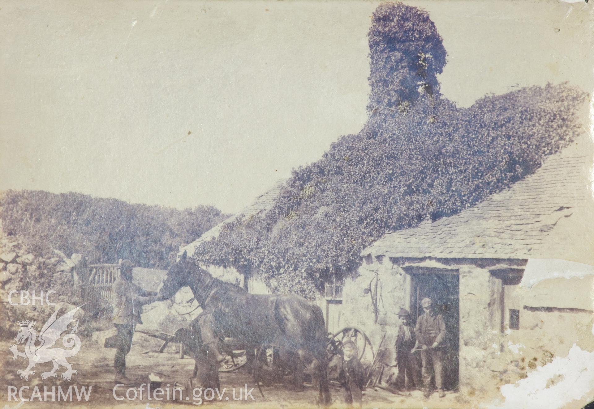 Documents and photographs associated with smithy.