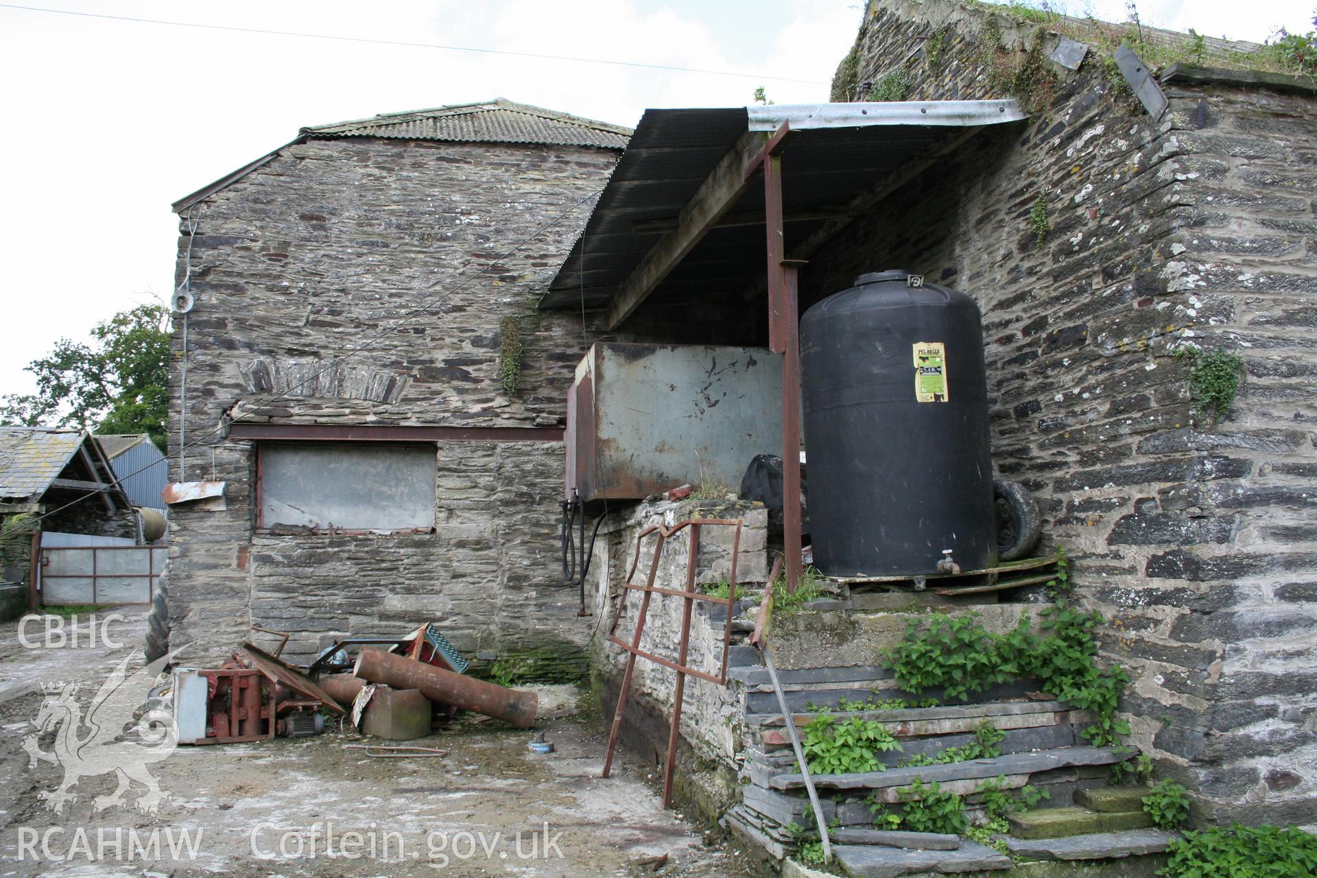 Barn exterior, at south end with east end of stable.