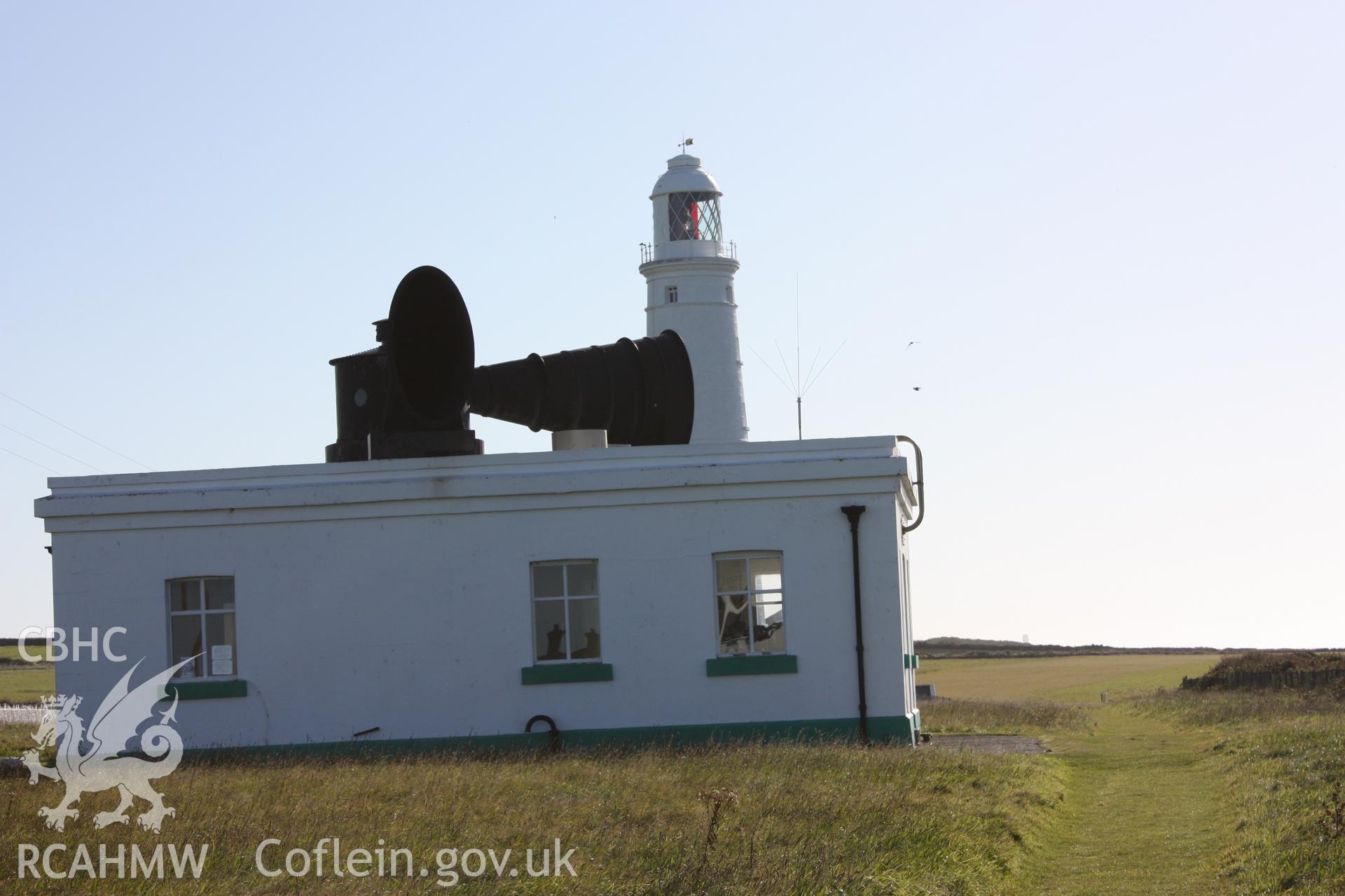Building viewed from west showing signal horn on roof (east lihgthouse in background)