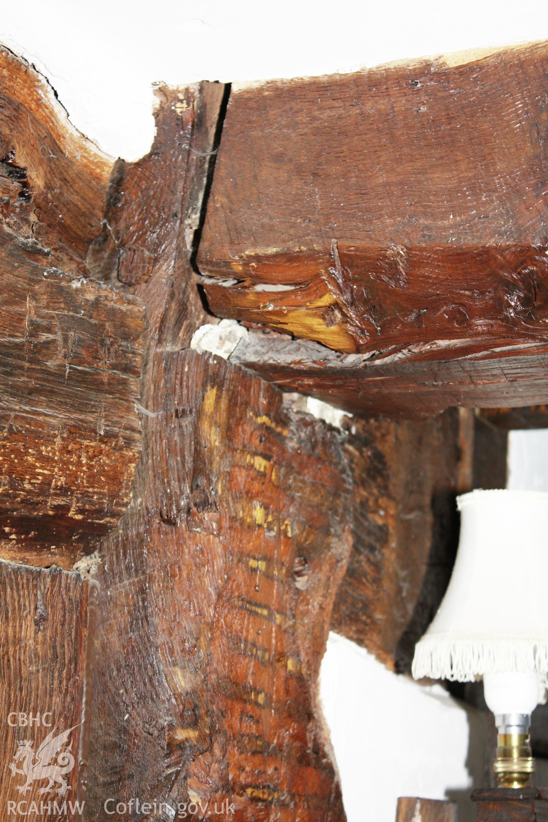 Interior of hall, framed north wall, detail of intermediate post and ceiling-beam joint