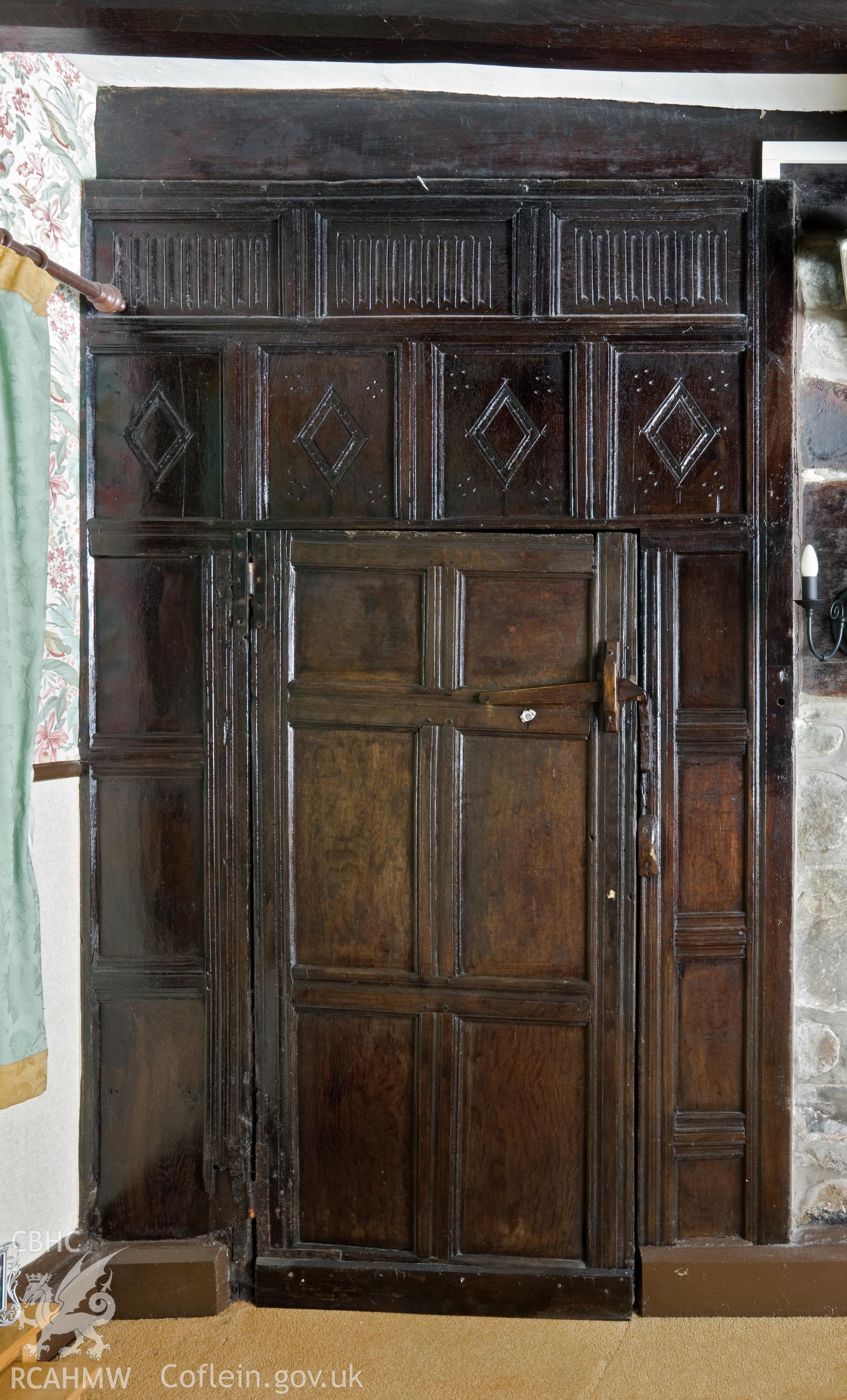 Panelled door, and wall partition.