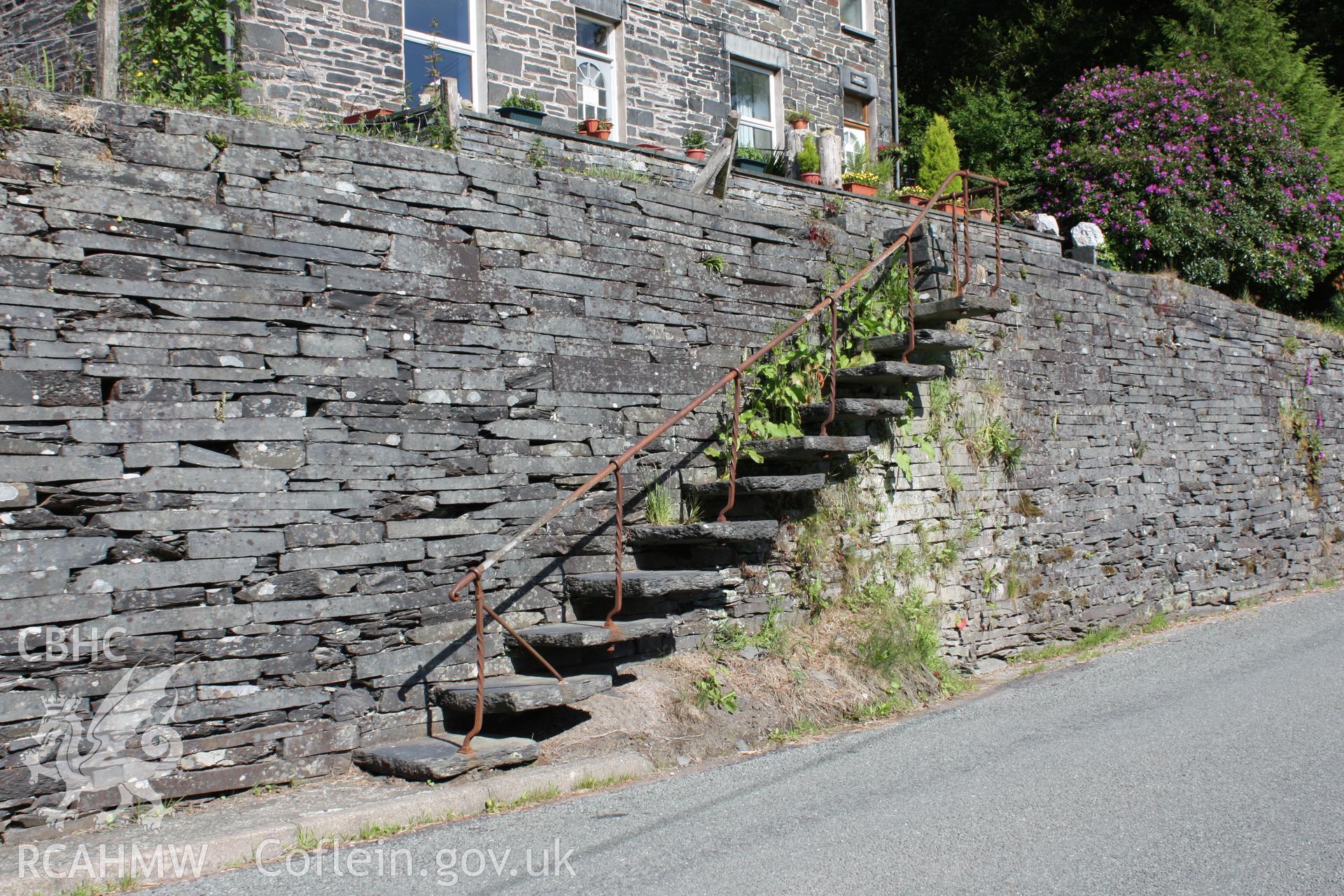 Slate steps leading up to the trackbed of the Corris Railway at SH7699 0963, Aberllefenni.