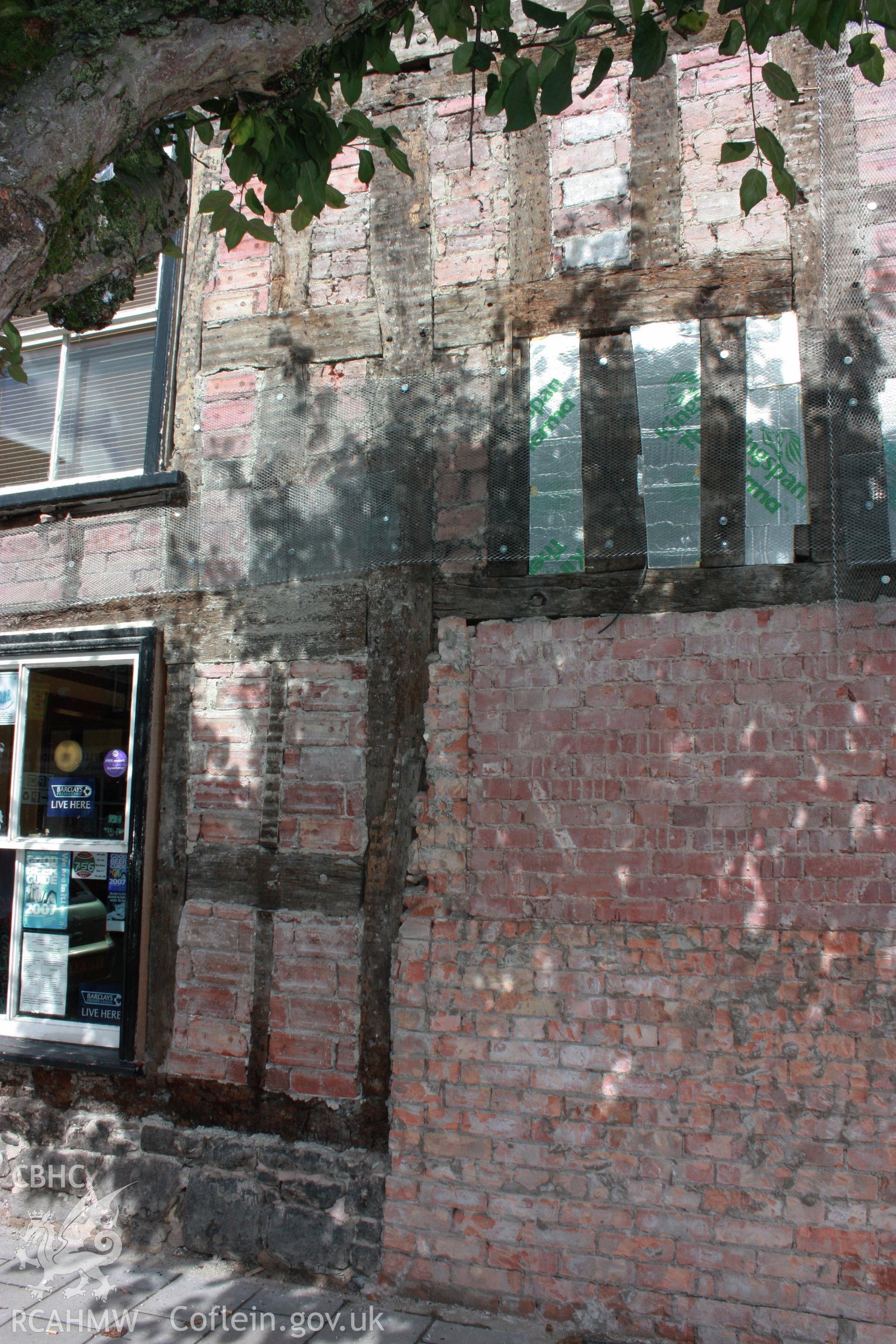 South elevation on right side, detail at ground.