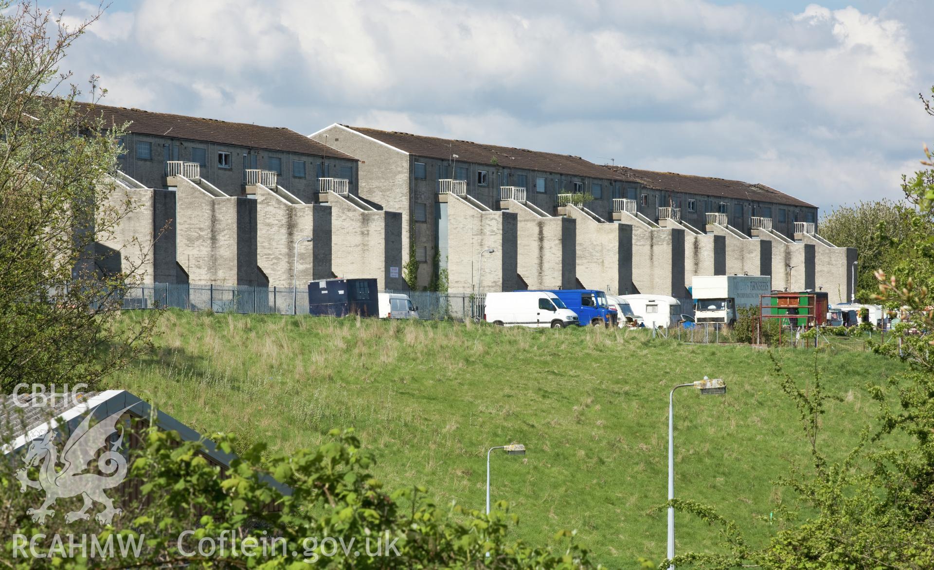 Distant view of Highfield Road flats from the east.