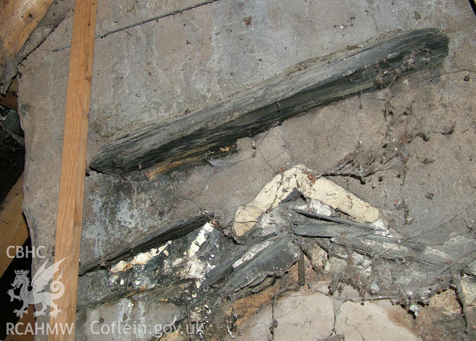 Chimney dripstone & ridge tile , inside later roof.