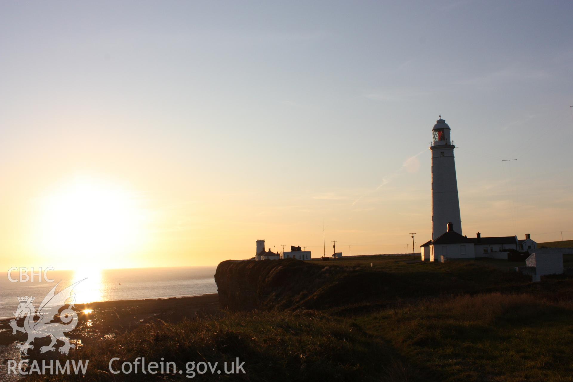 West tower (in centre) and East tower to right from the east at sunset