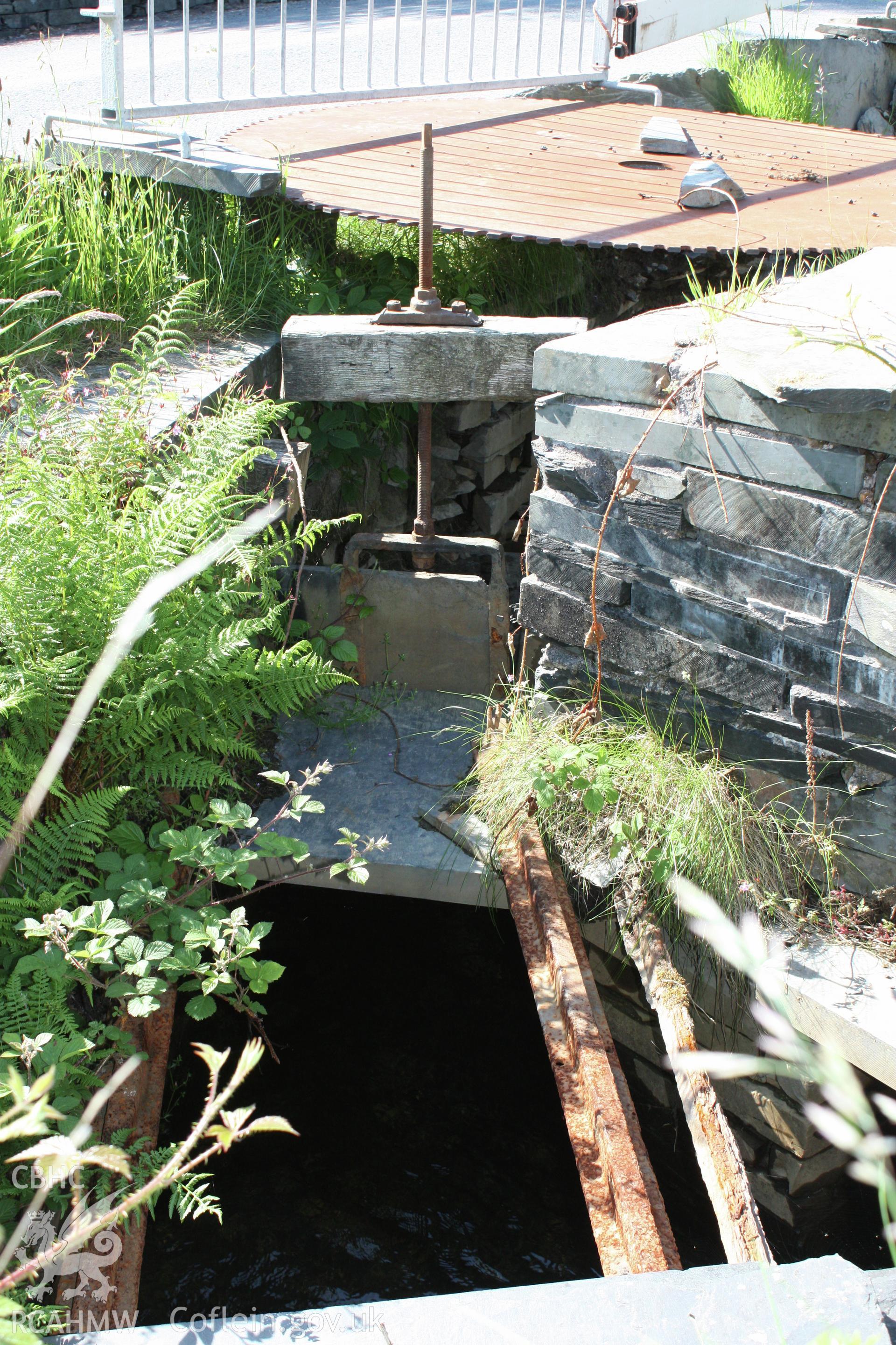 Aberllefenni Slate Quarry reservoir and dam.  Sluice gate.