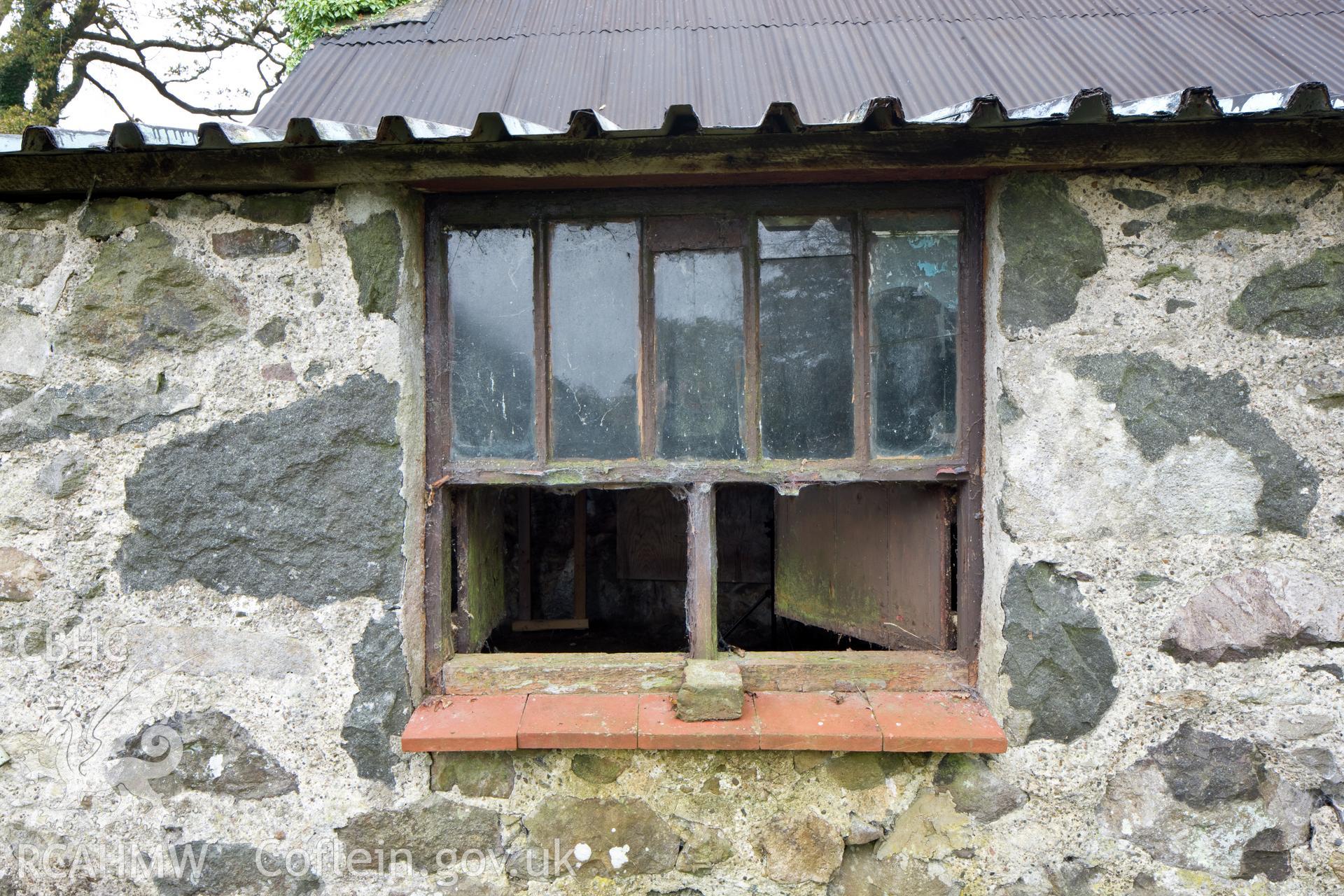 Detail of rear window, access for rod/bar open.