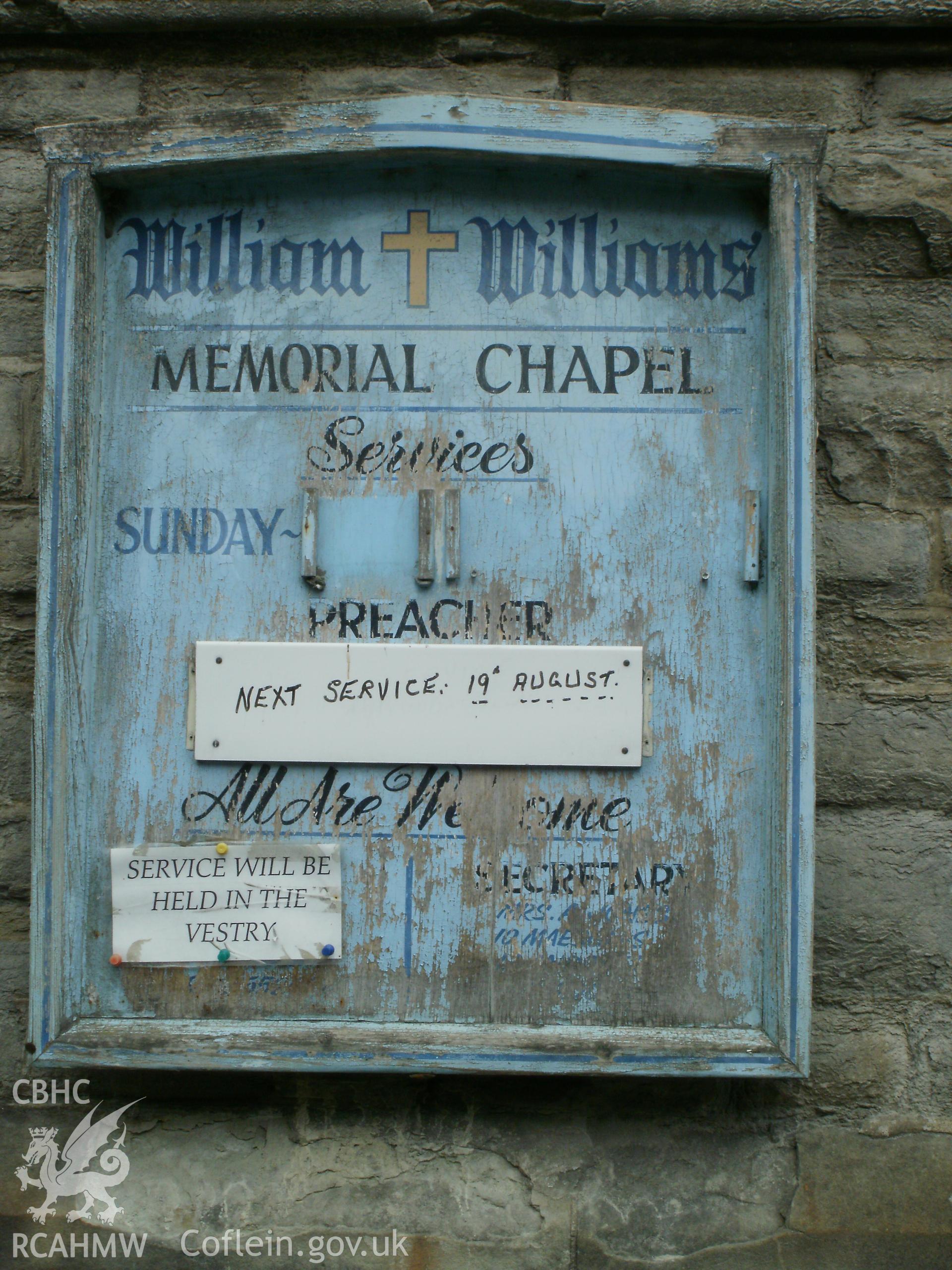 Noticeboard on south front.
