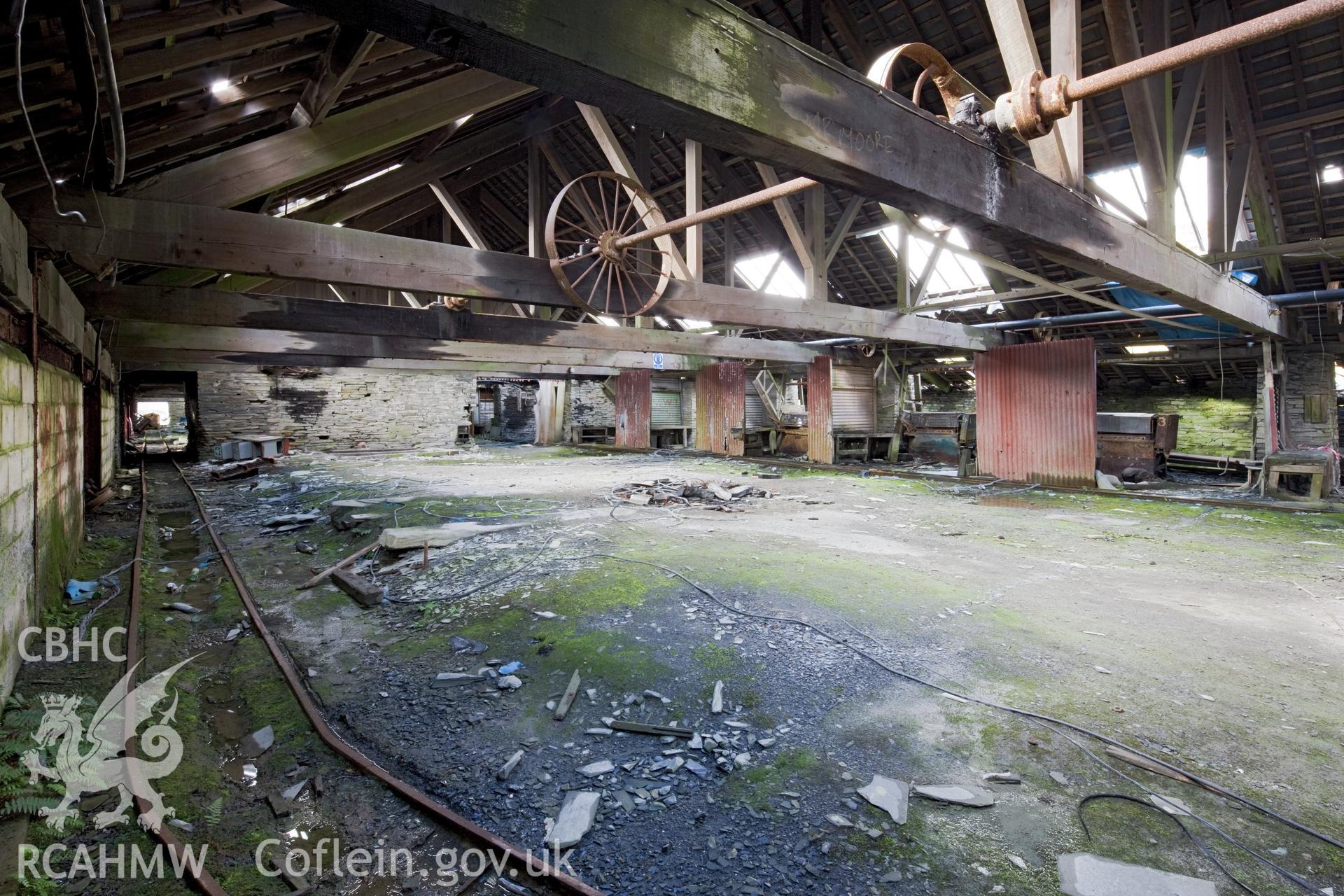 Dressing machines, racked down the external walls.