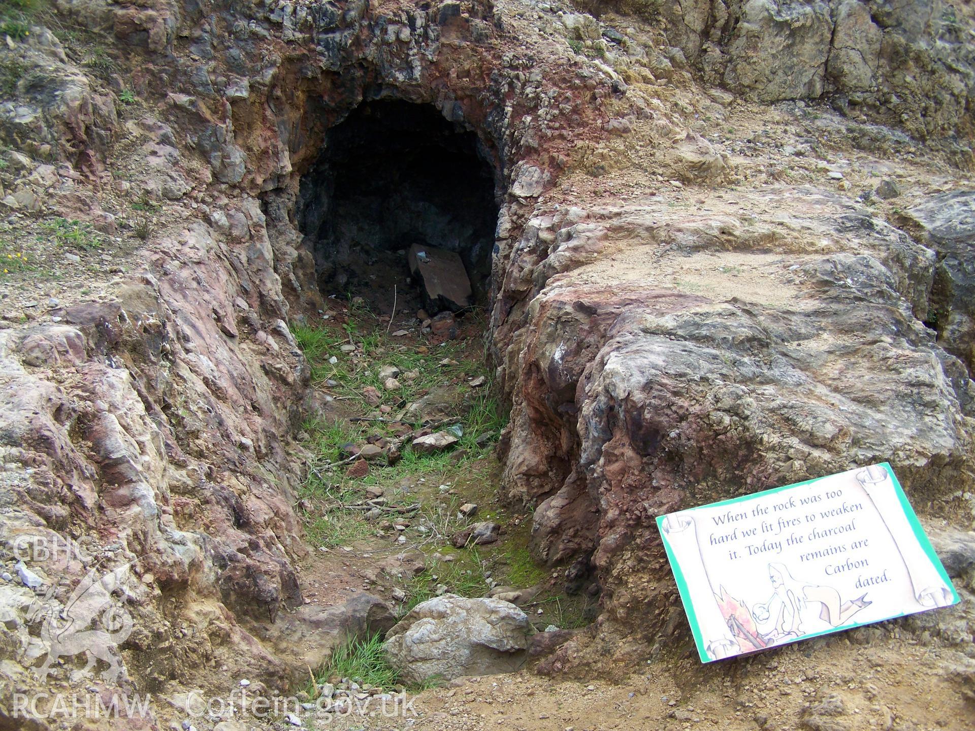 Tunnel where fire was used to weaken the rock, with interpretative signing