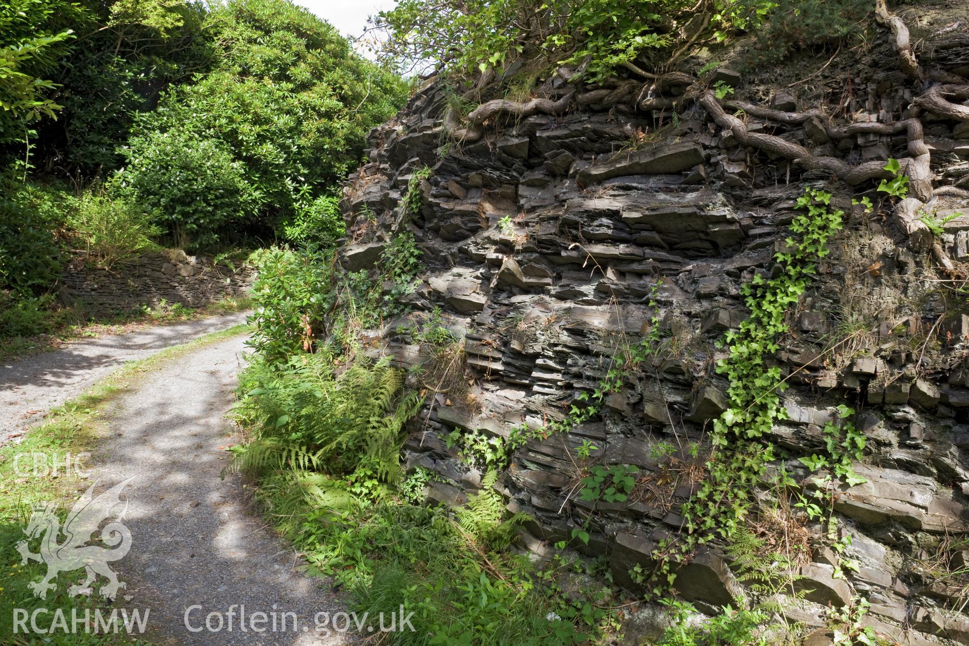 Rock strata by entrance.