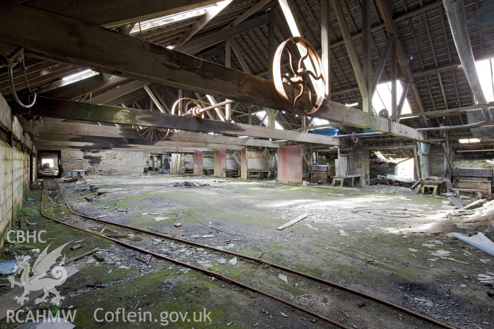 Dressing machines, racked down the external walls.
