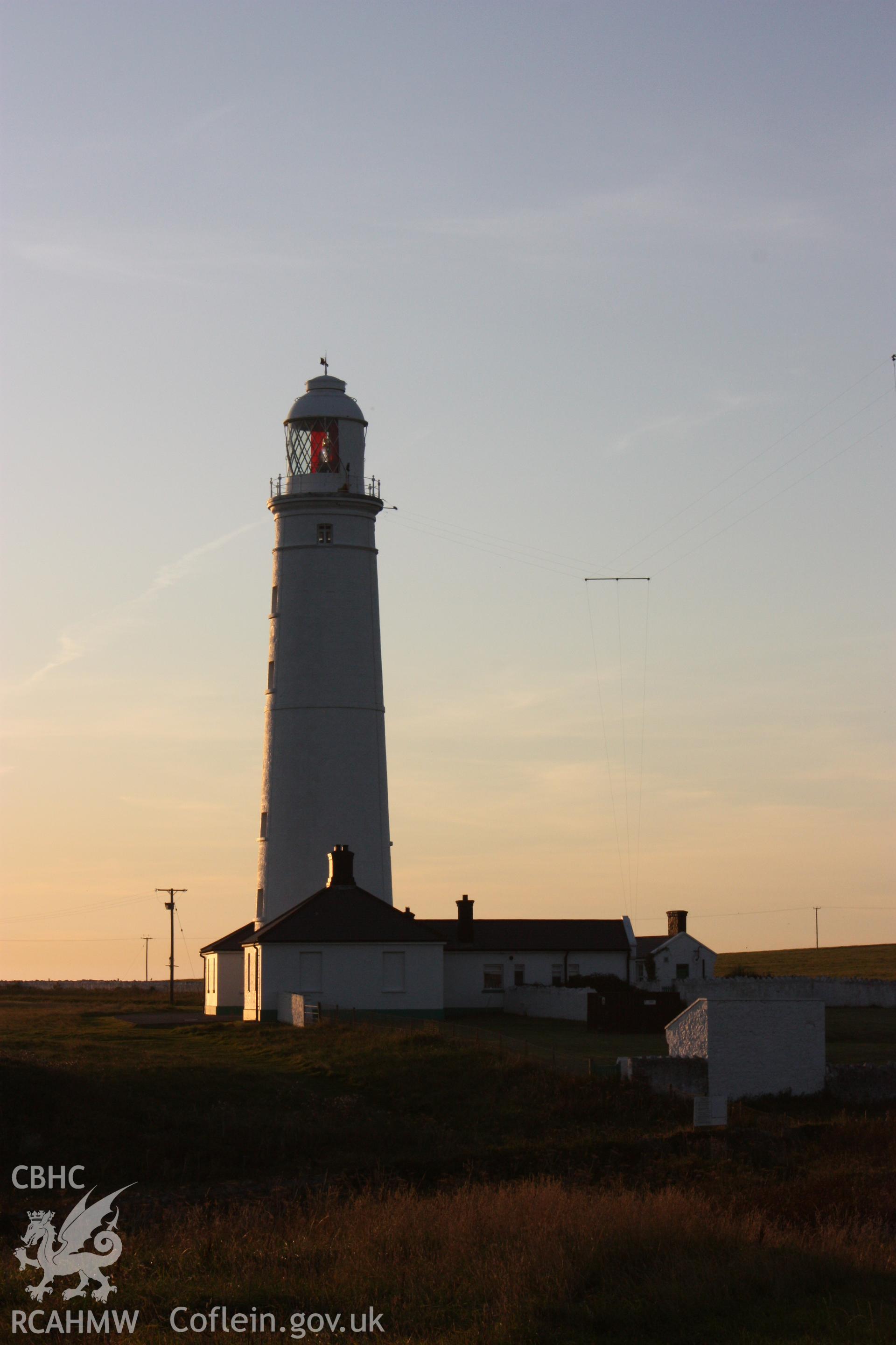 Nash lighthouse east tower and associated buildings viewed from east at sunset